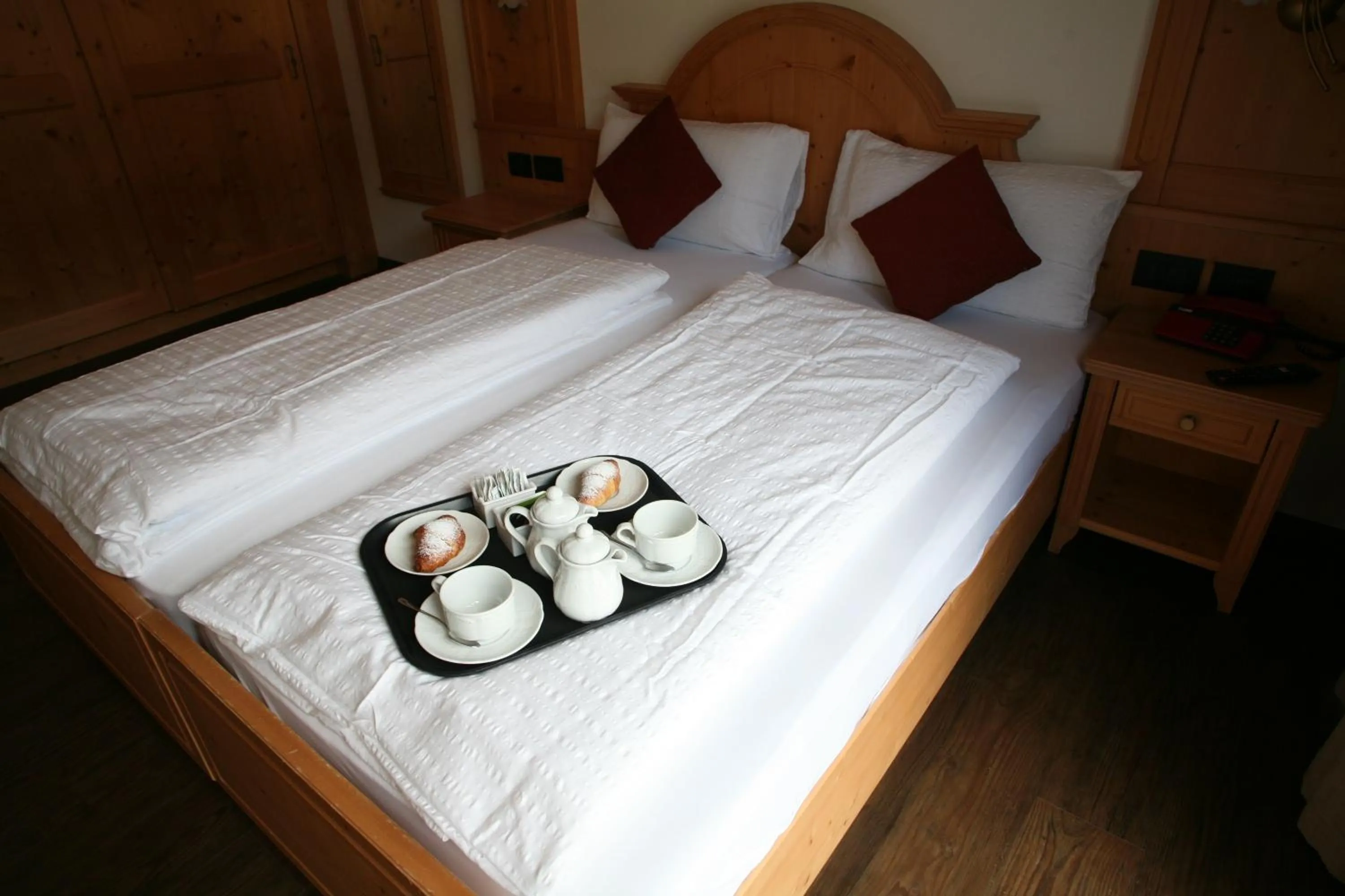 Bed in Alpen Hotel Vidi