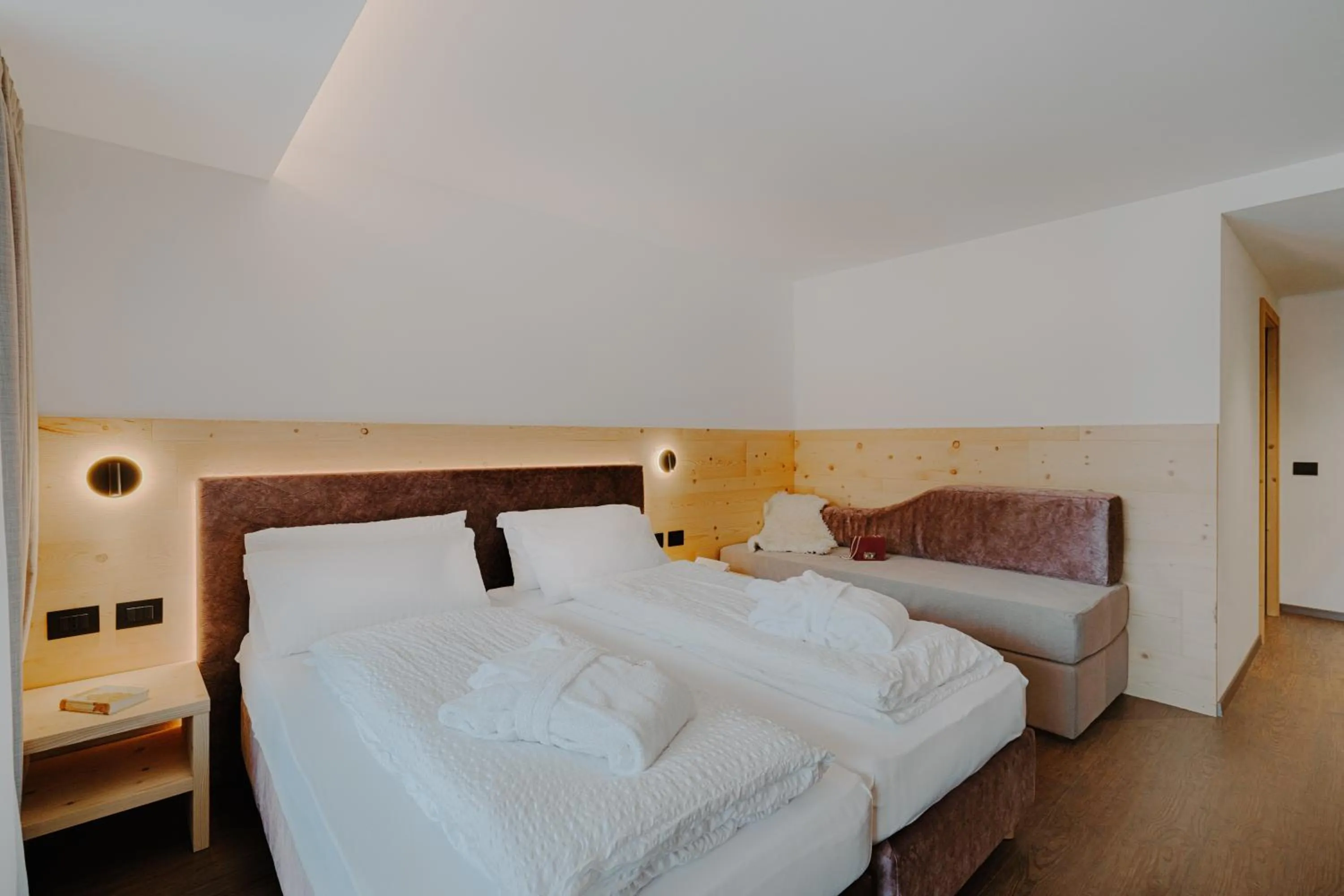 Bed in Alpen Hotel Vidi