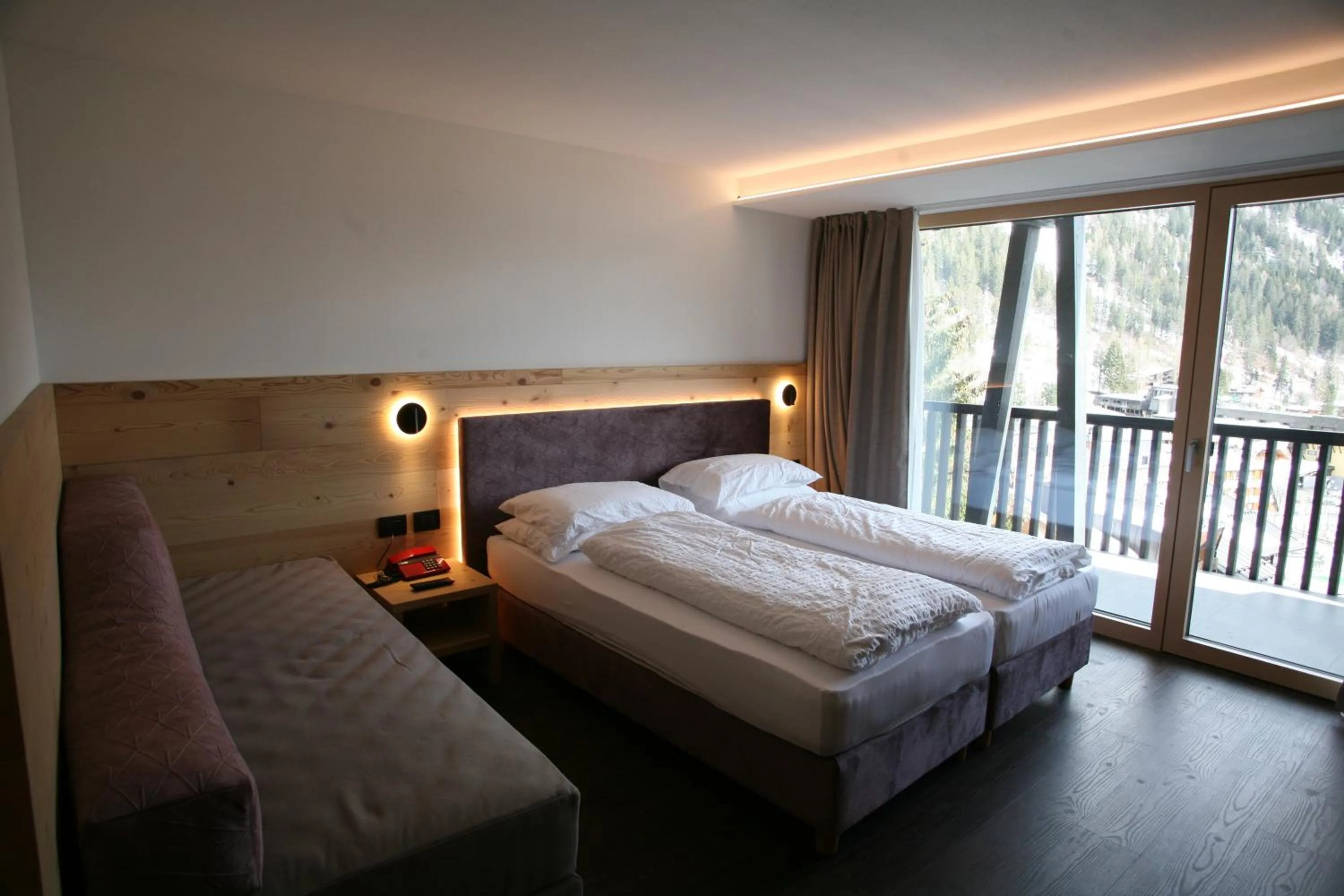 Bed in Alpen Hotel Vidi