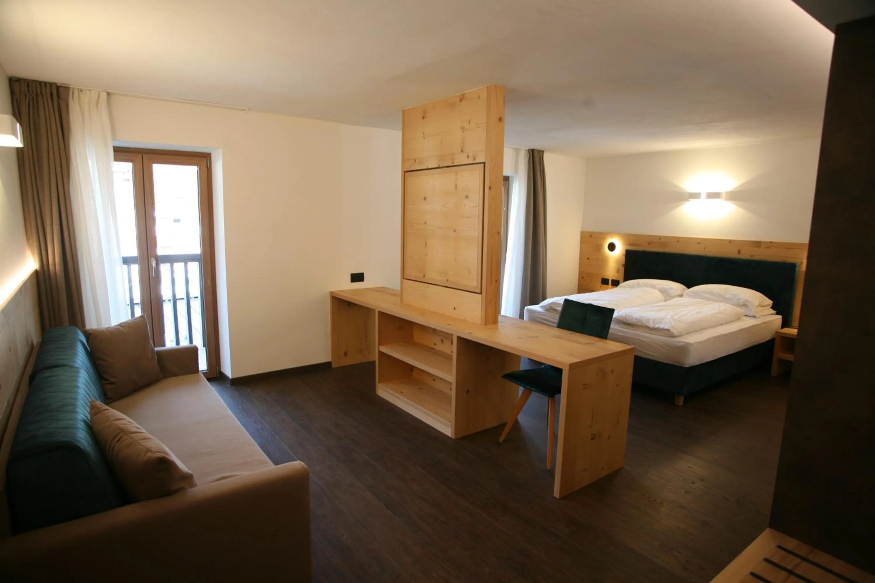 Bed in Alpen Hotel Vidi