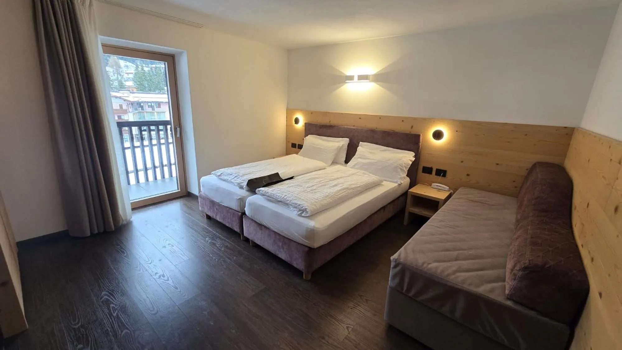 Bed in Alpen Hotel Vidi