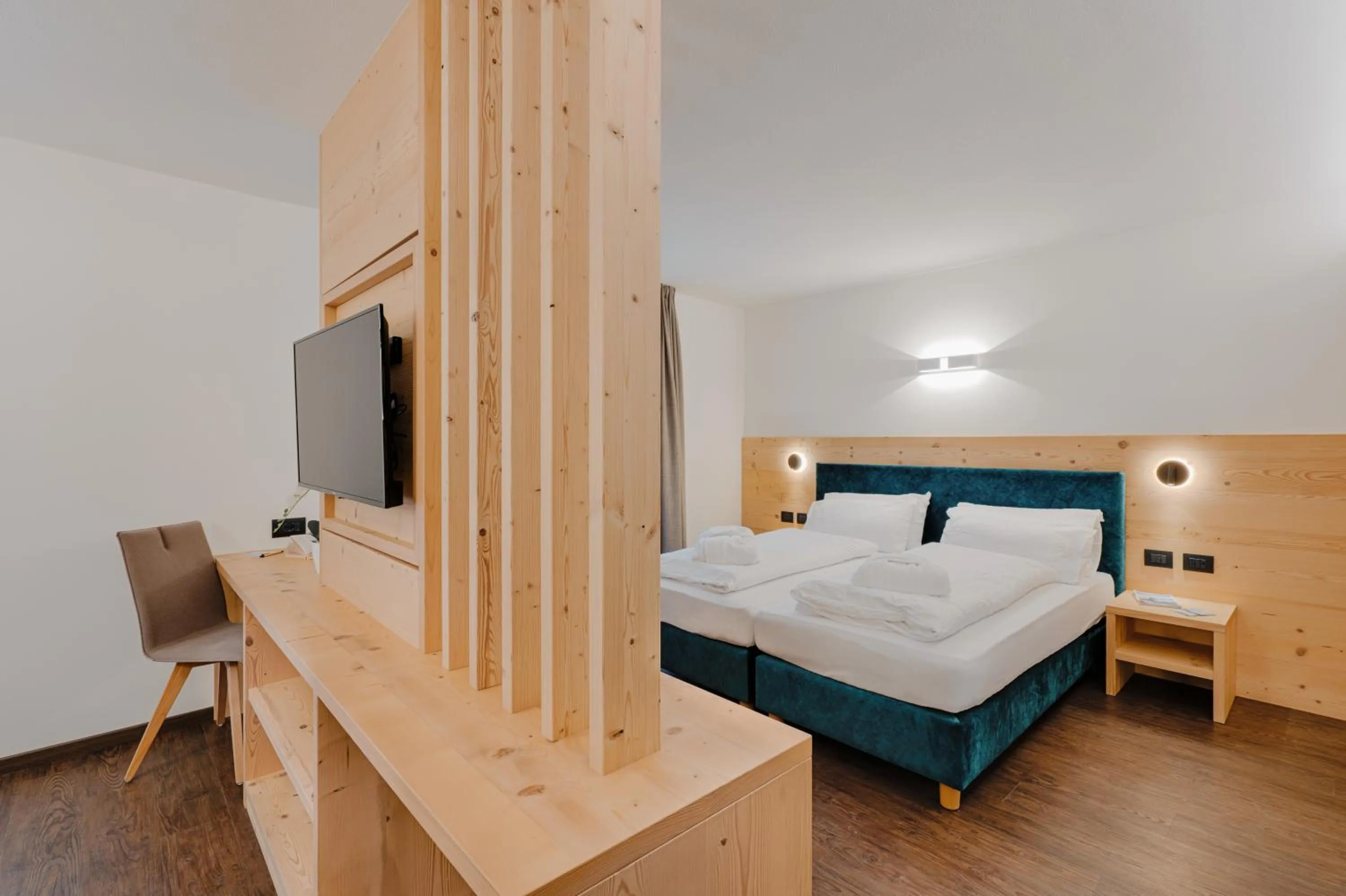 Bed in Alpen Hotel Vidi