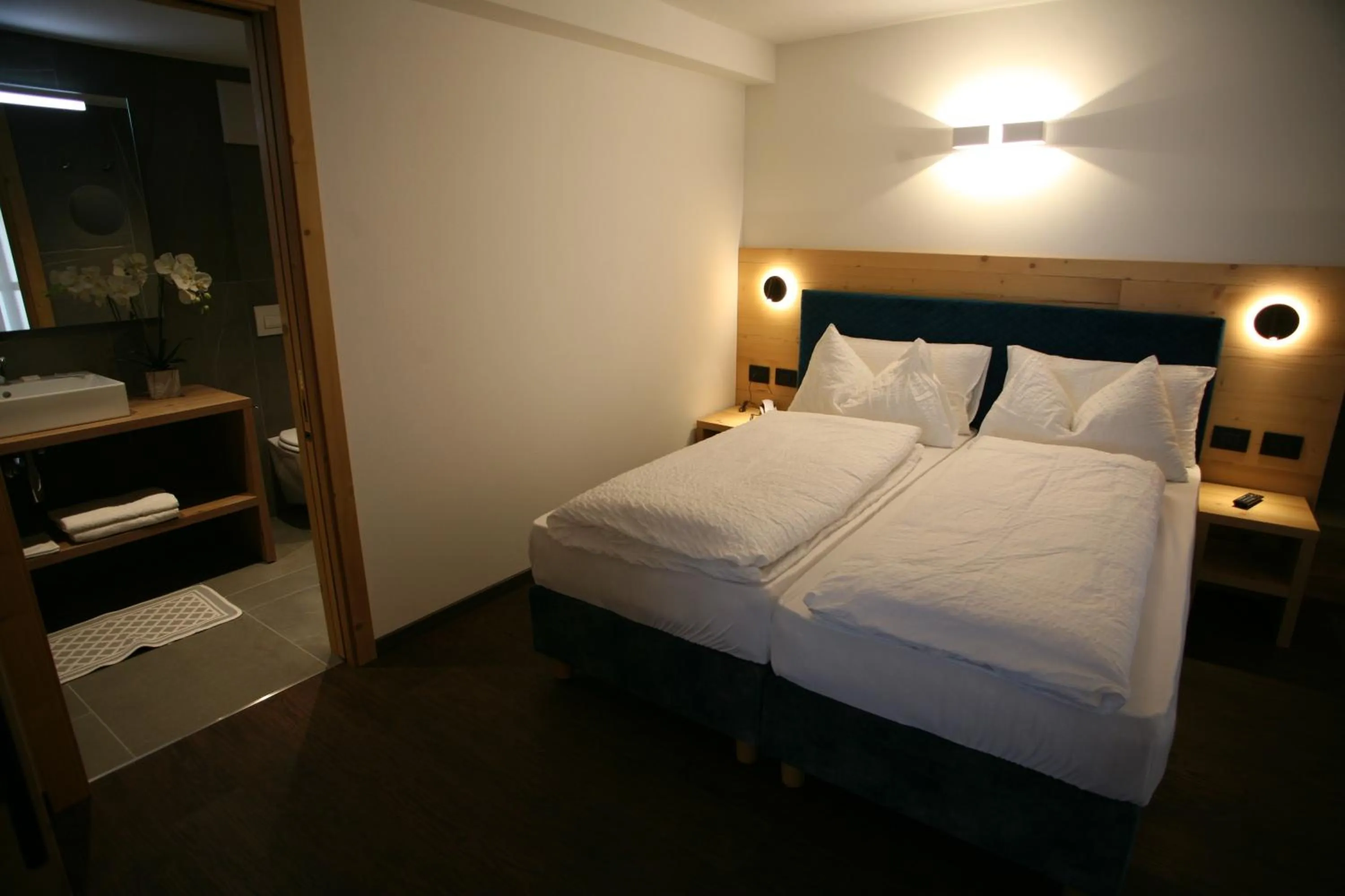 Bed in Alpen Hotel Vidi