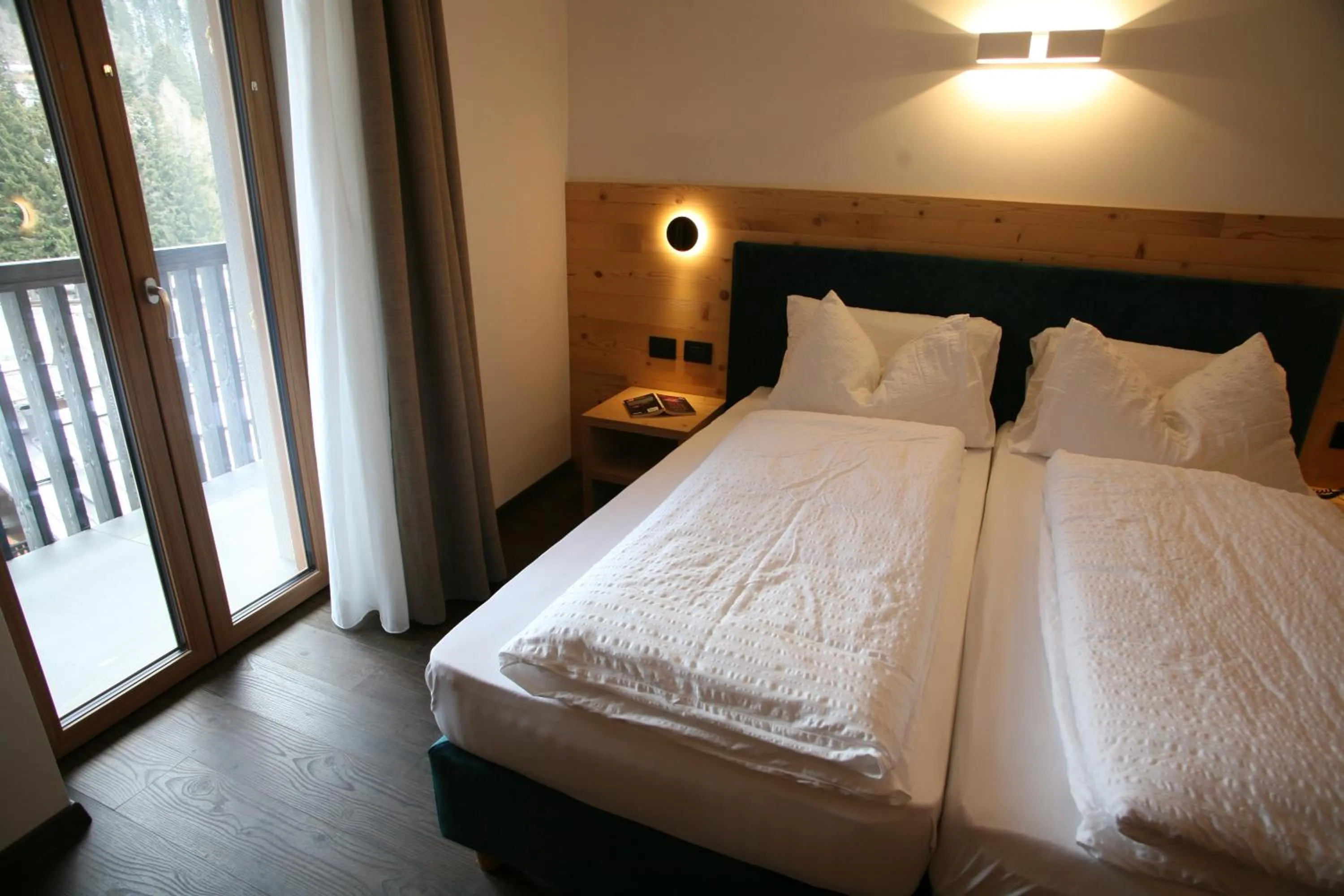 Bed in Alpen Hotel Vidi