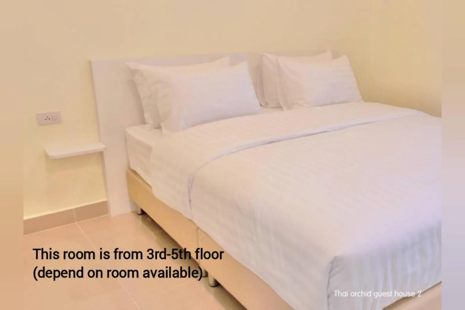 Bed in Thai Orchid Guest House