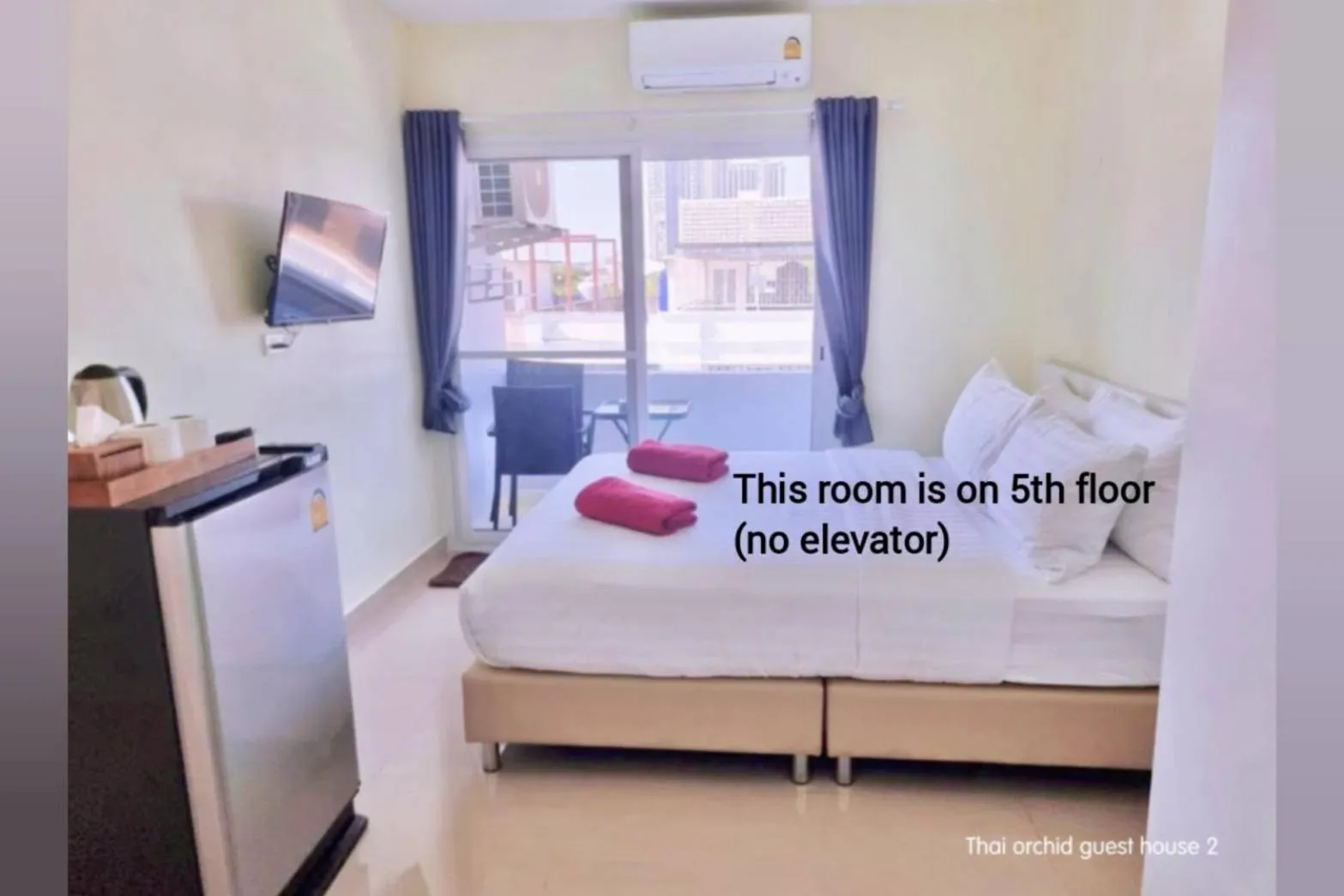 Bed in Thai Orchid Guest House