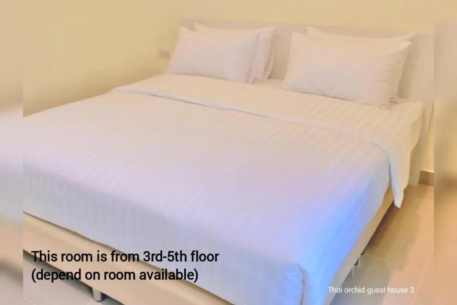 Bed in Thai Orchid Guest House