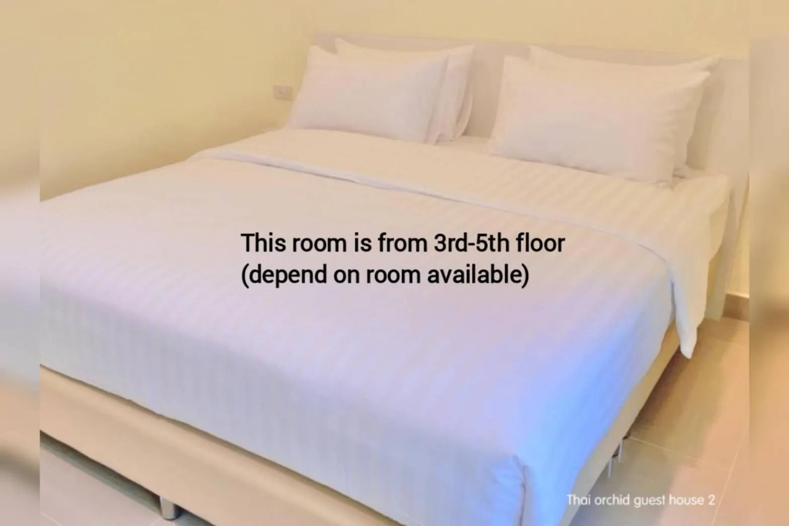 Bed in Thai Orchid Guest House