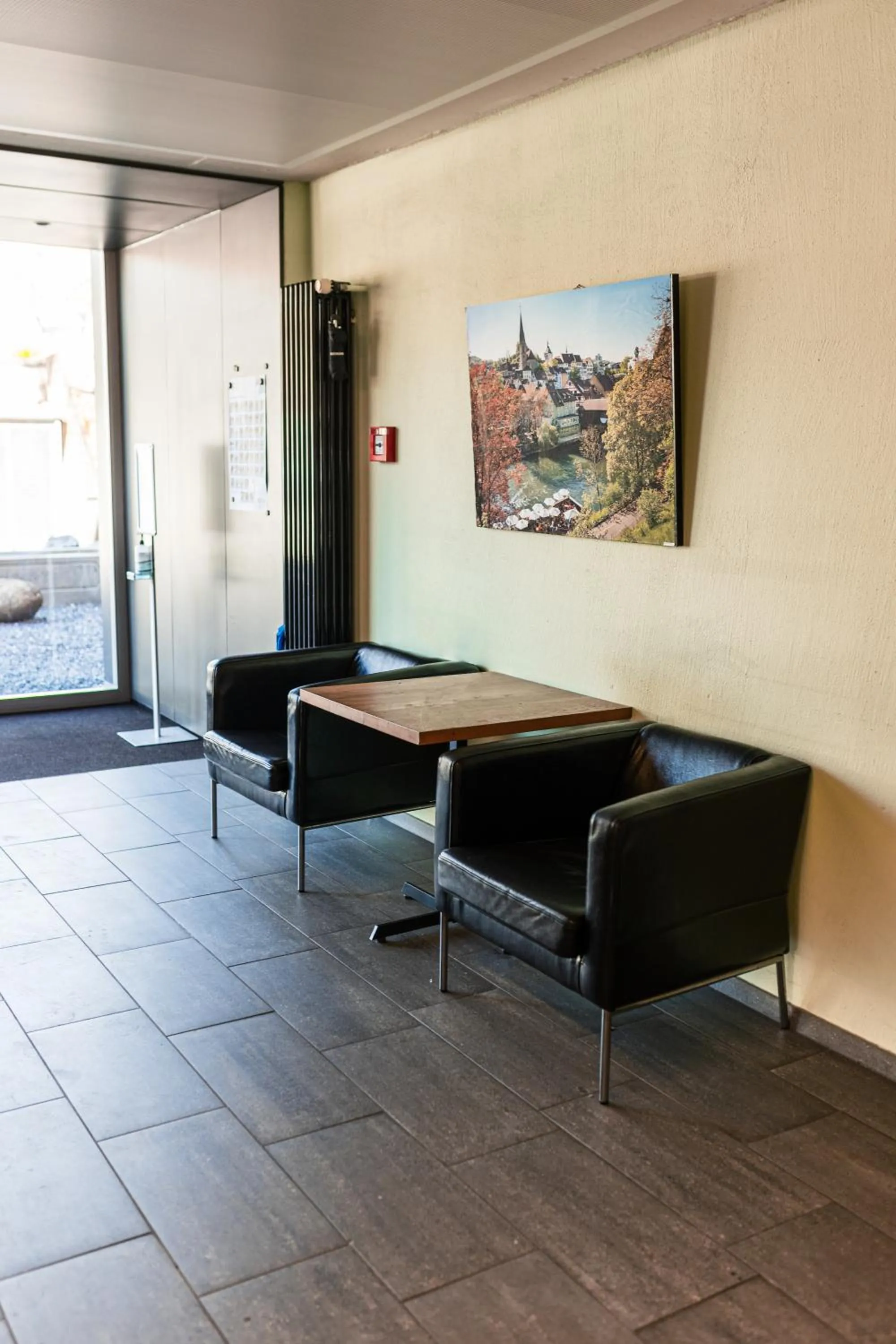 Communal lounge/ TV room in Baden Youth Hostel