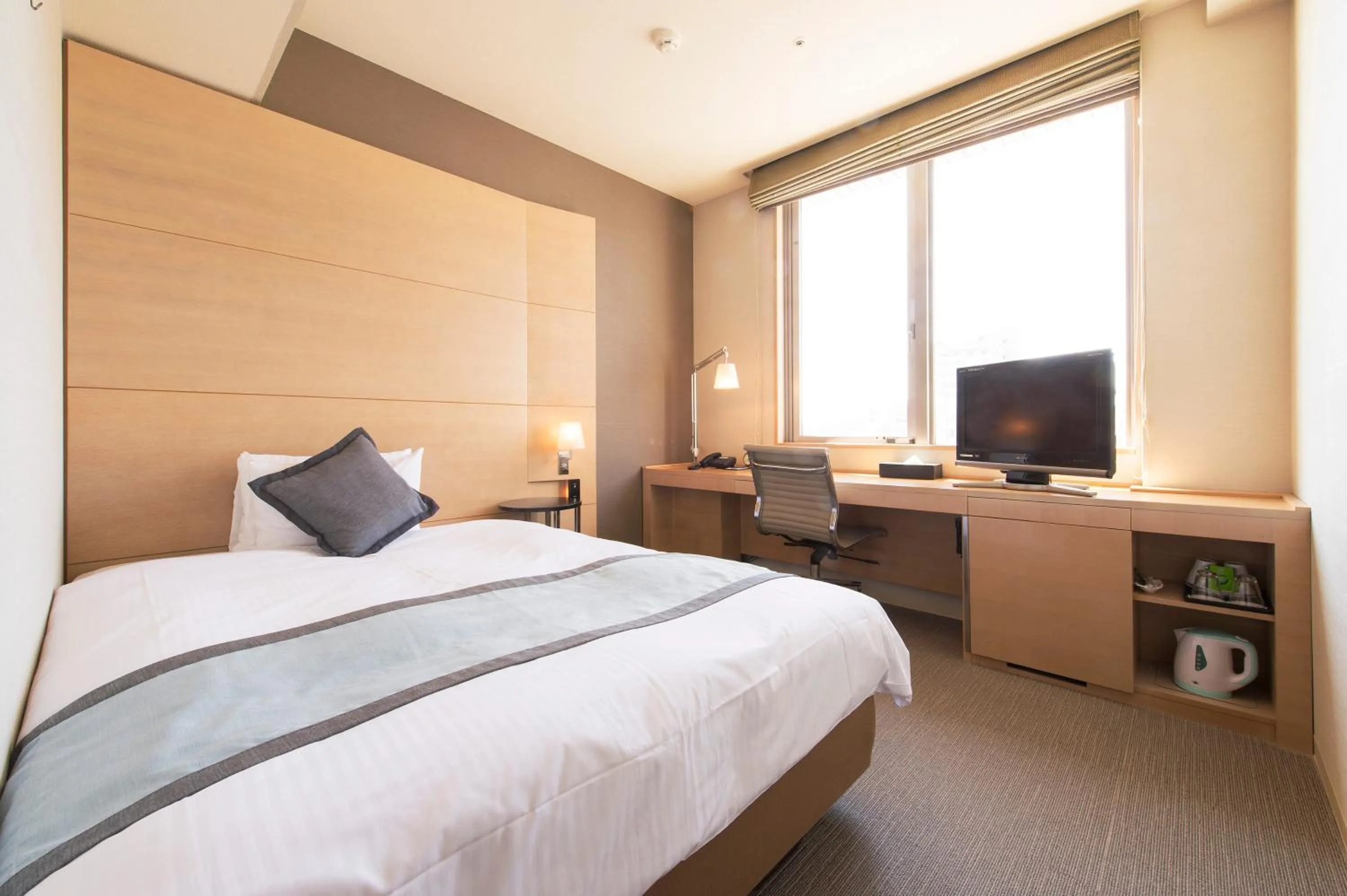 Bed in K's Street Hotel Miyazaki