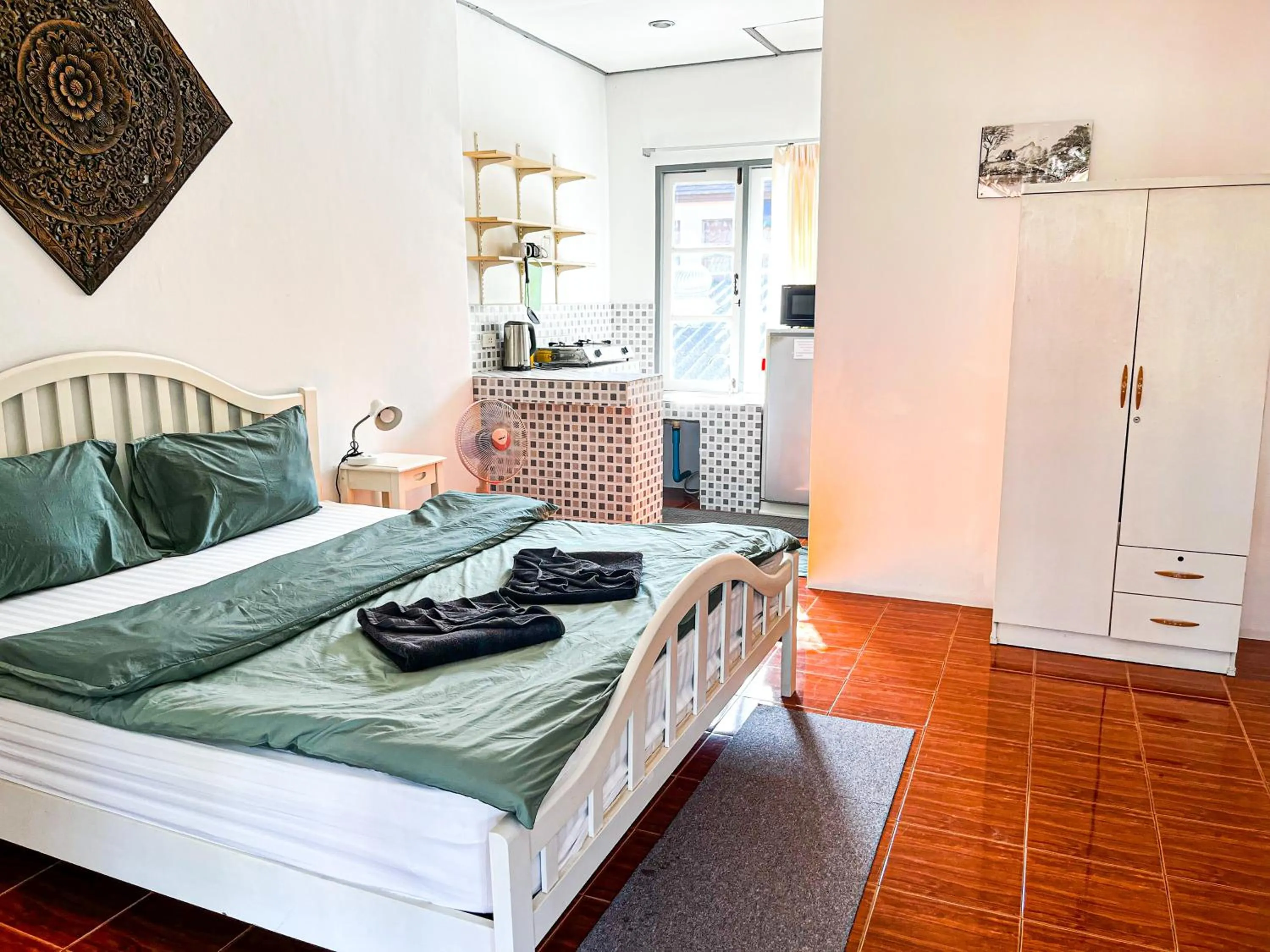 Bed in Amy Village Apartments & Digital Hub