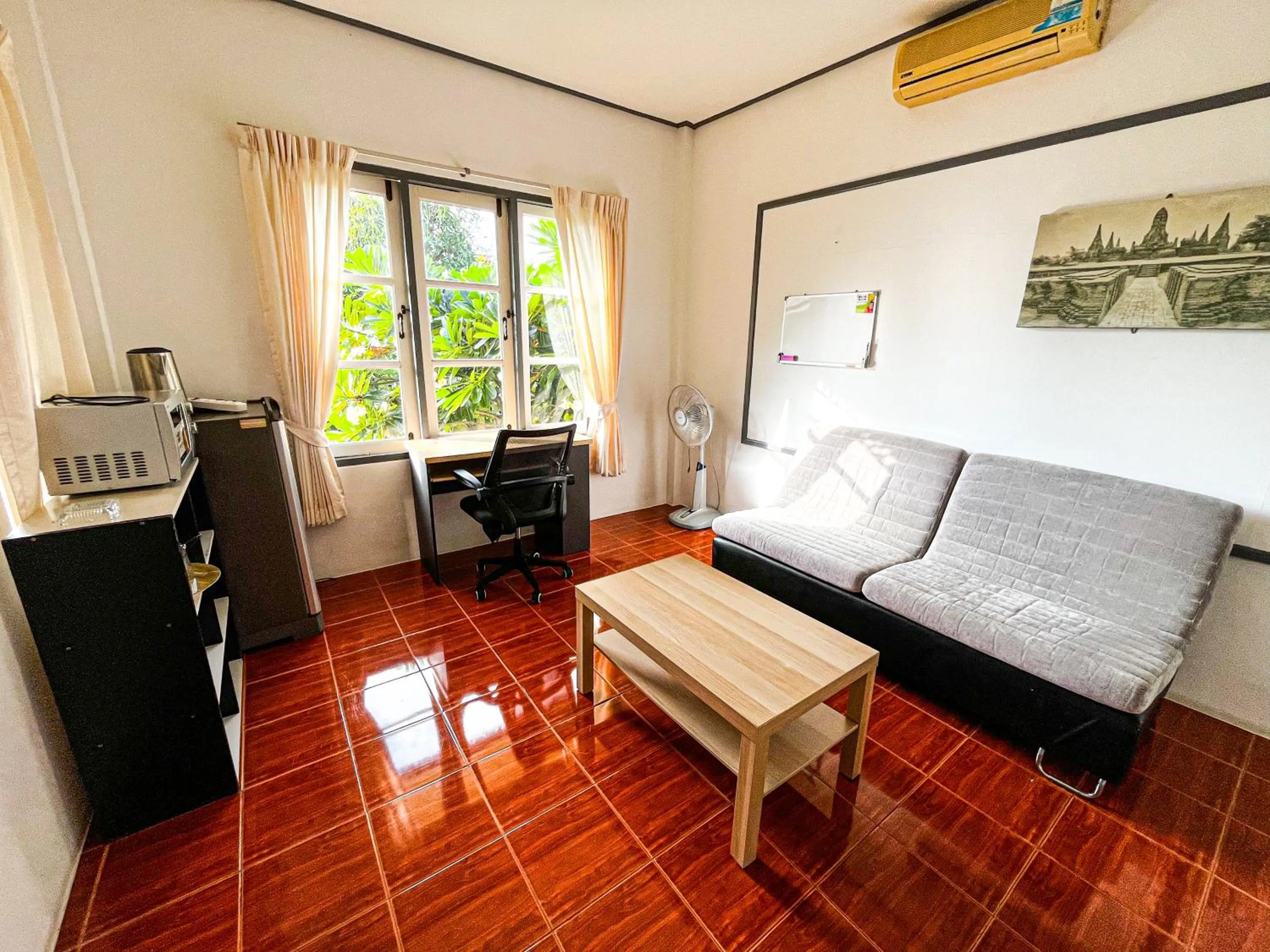 Living room in Amy Village Apartments & Digital Hub