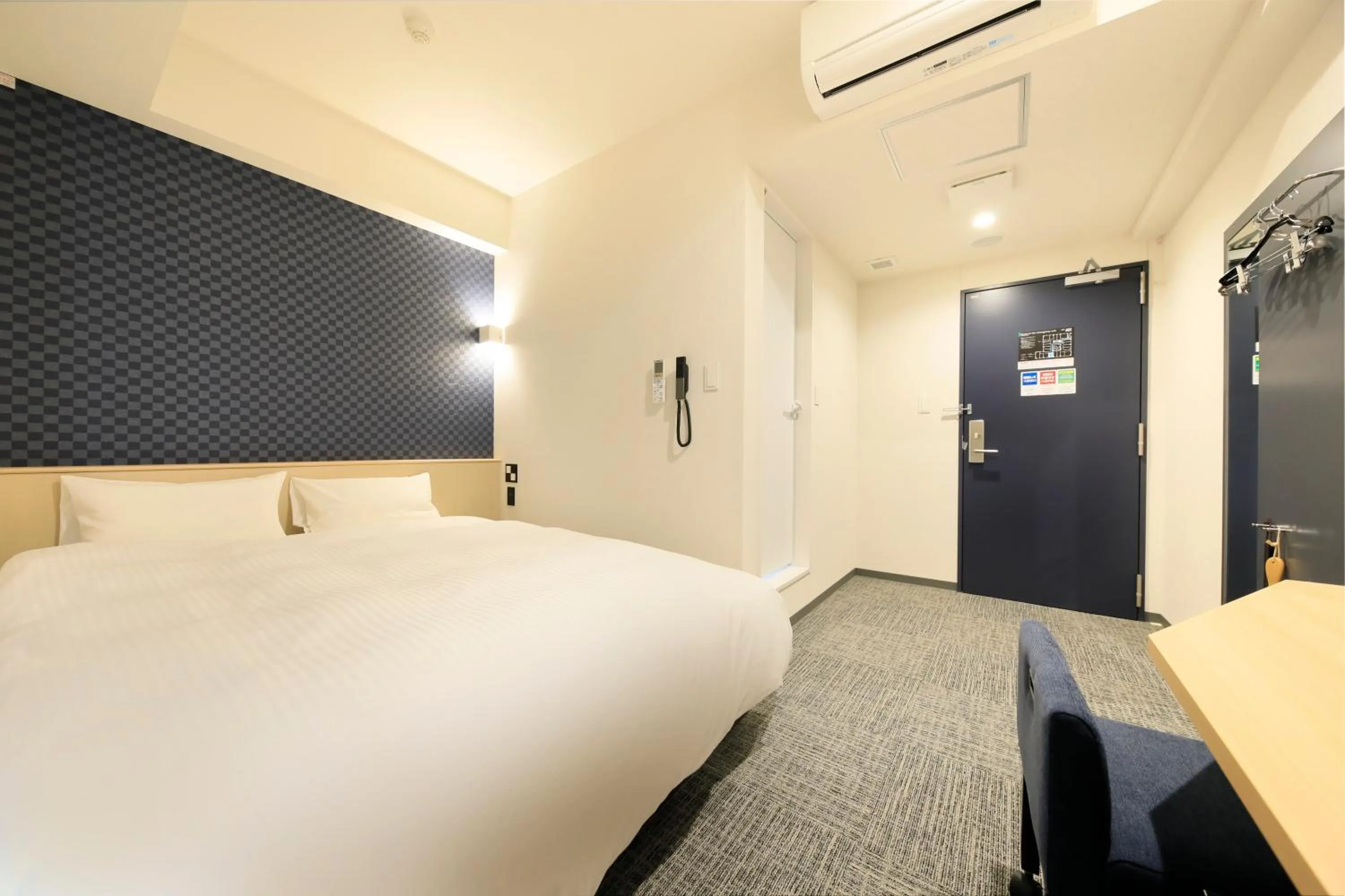 Bed in Hotel NewNagano NeXT