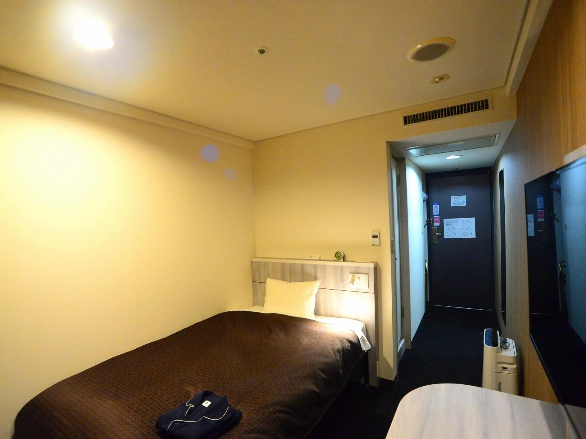 Bed in Sunwest Hotel Sasebo