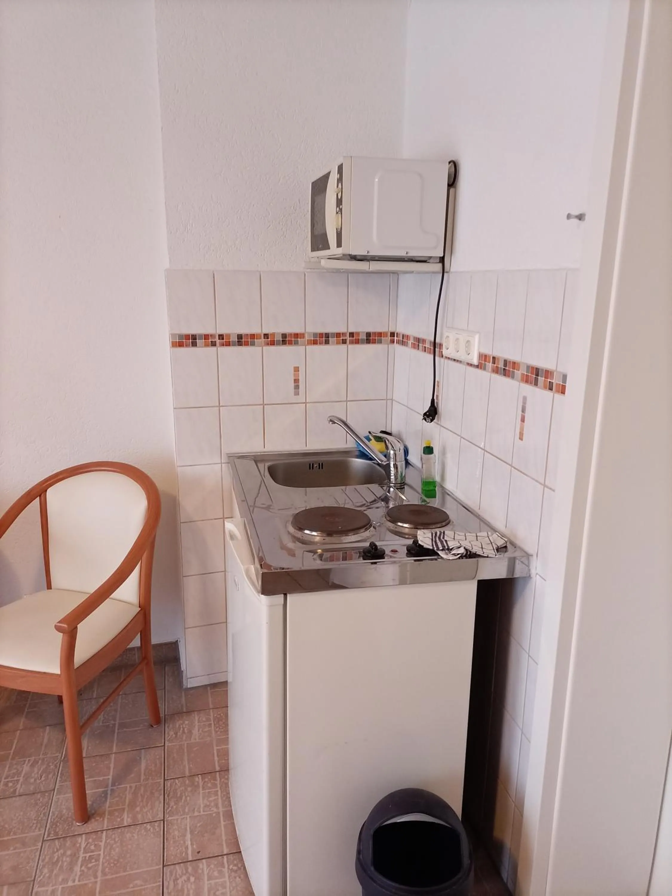 Kitchen or kitchenette in Hotel An der Karlstadt