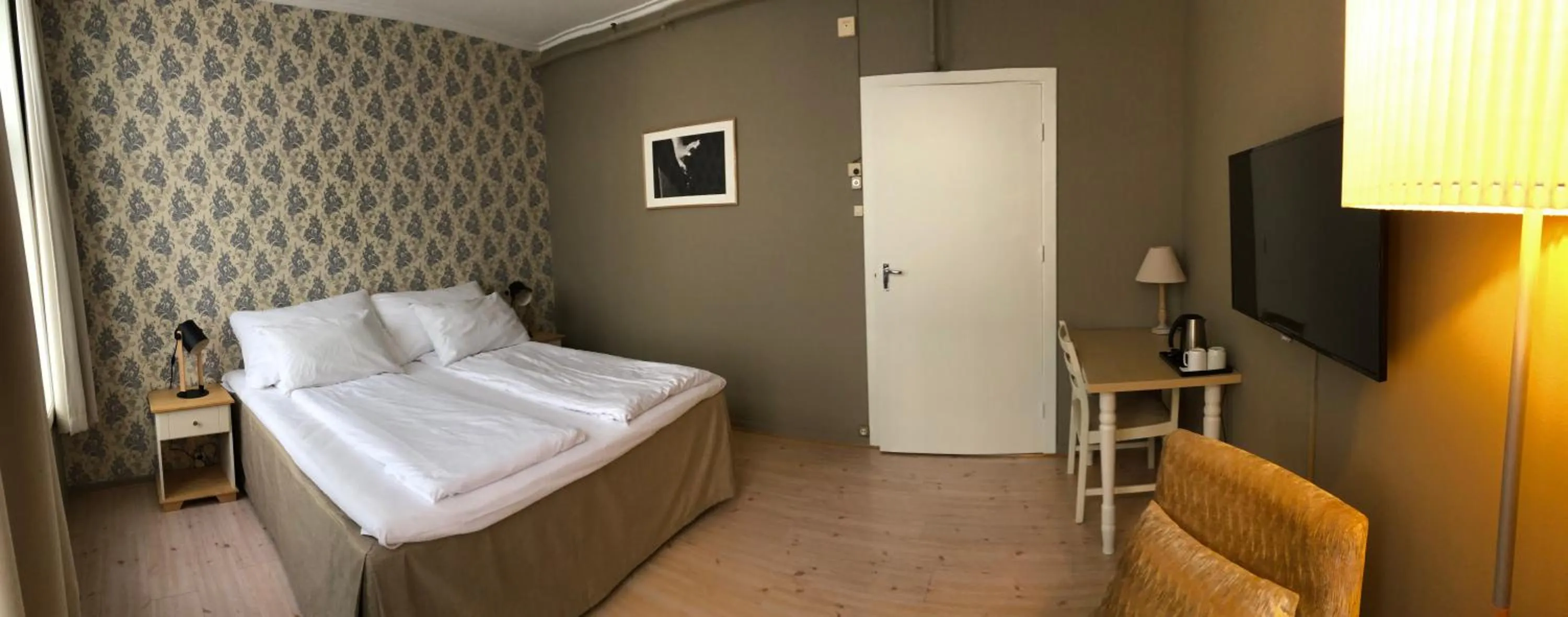 Photo of the whole room, Bed in Risør Hotel
