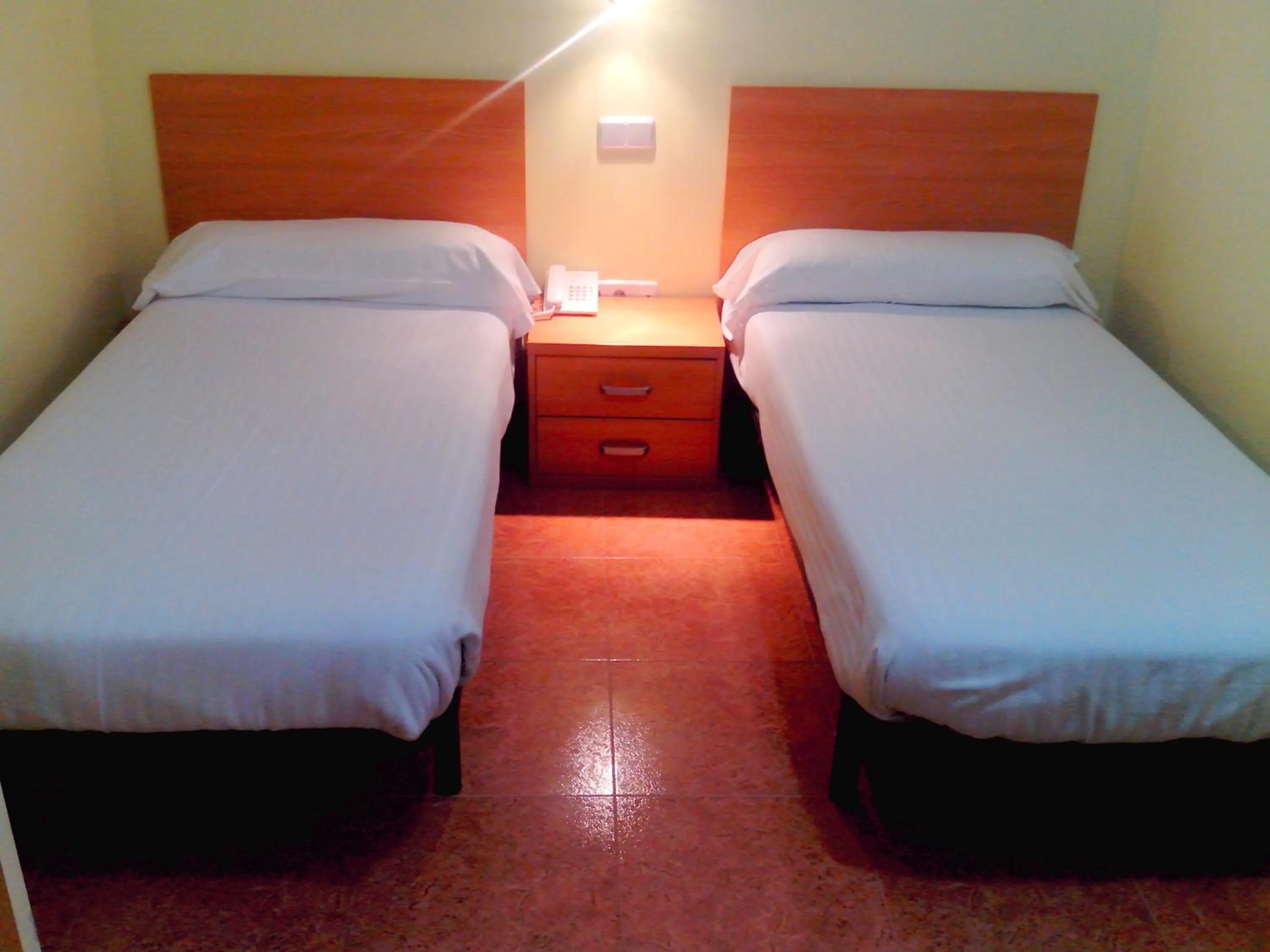 Bed in Hotel RC Ramon y Cajal