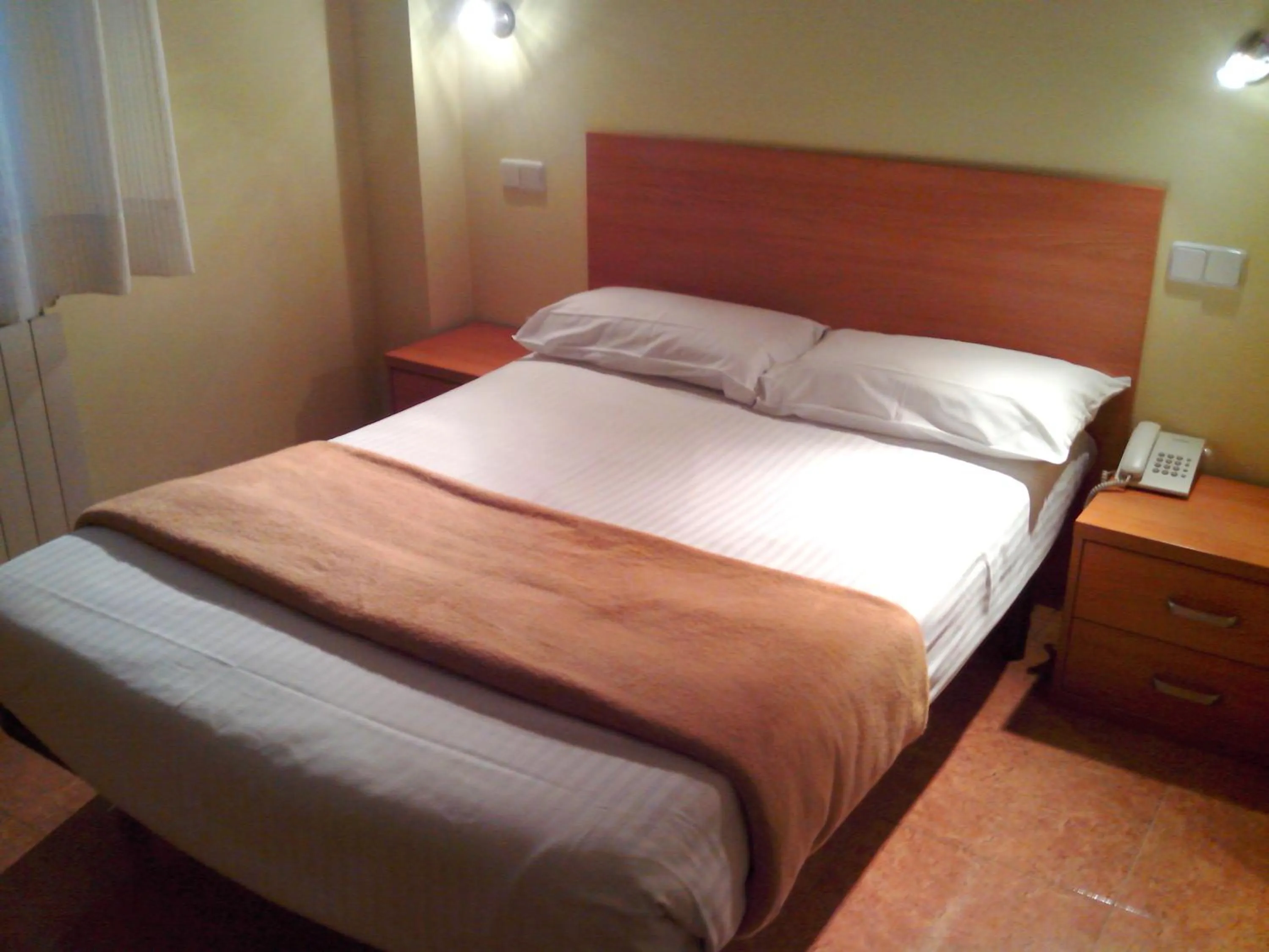 Bed in Hotel RC Ramon y Cajal