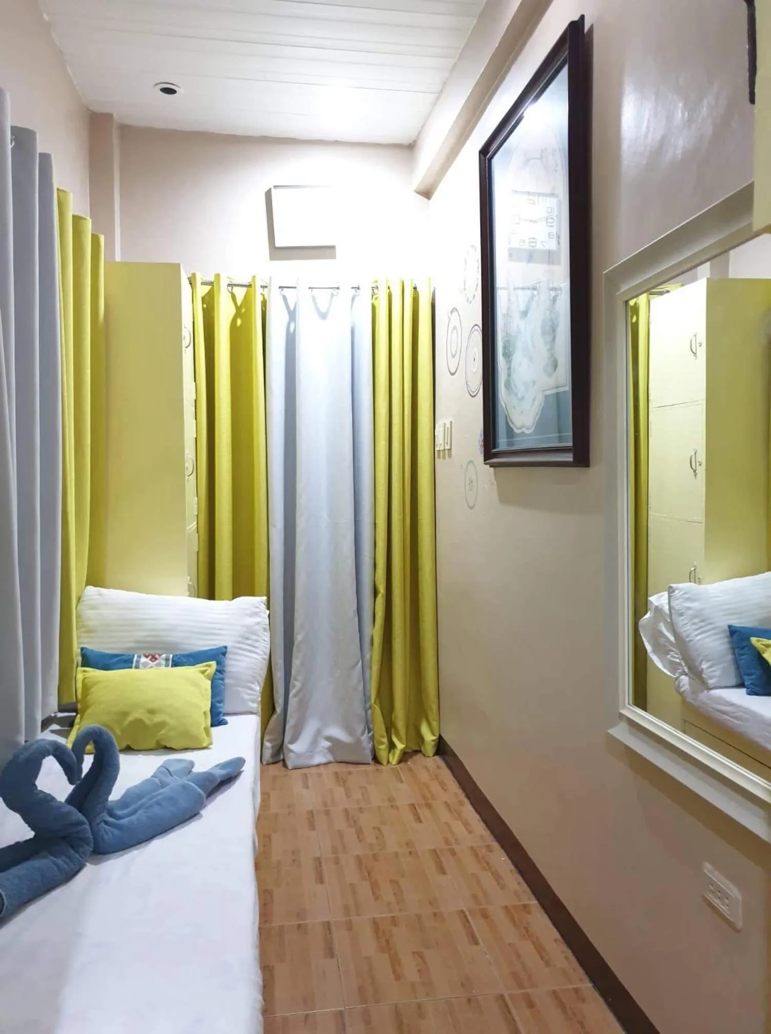 Seating area, Bed in Palompon lodge