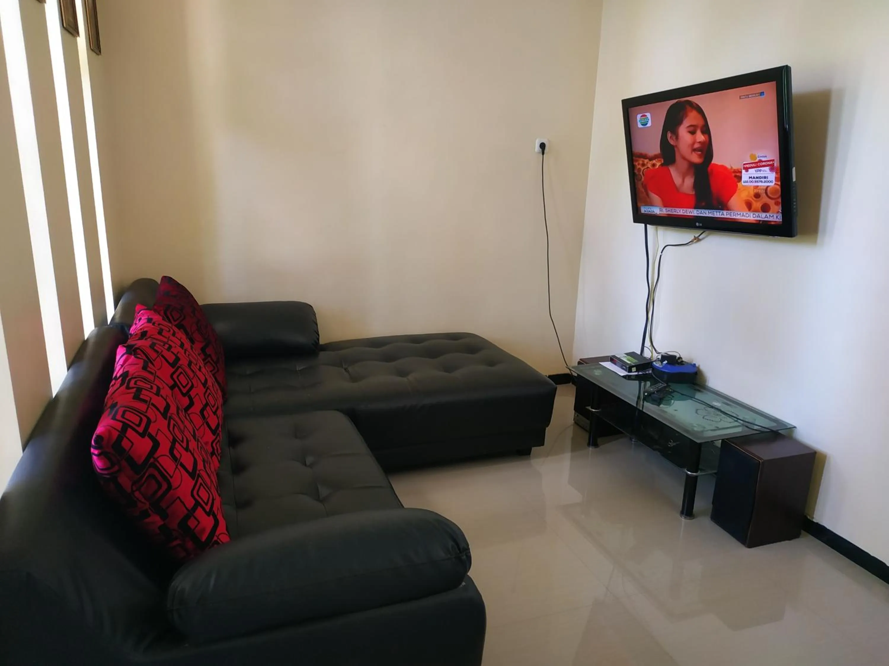 Communal lounge/ TV room in Villa Gumilang