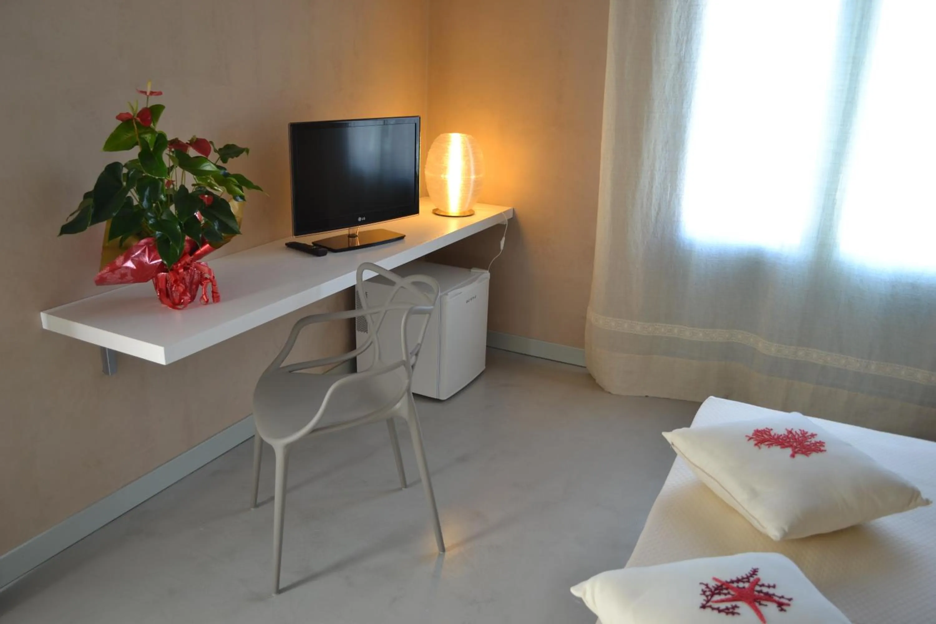Bed, TV/Entertainment Center in Relais Casina Miregia
