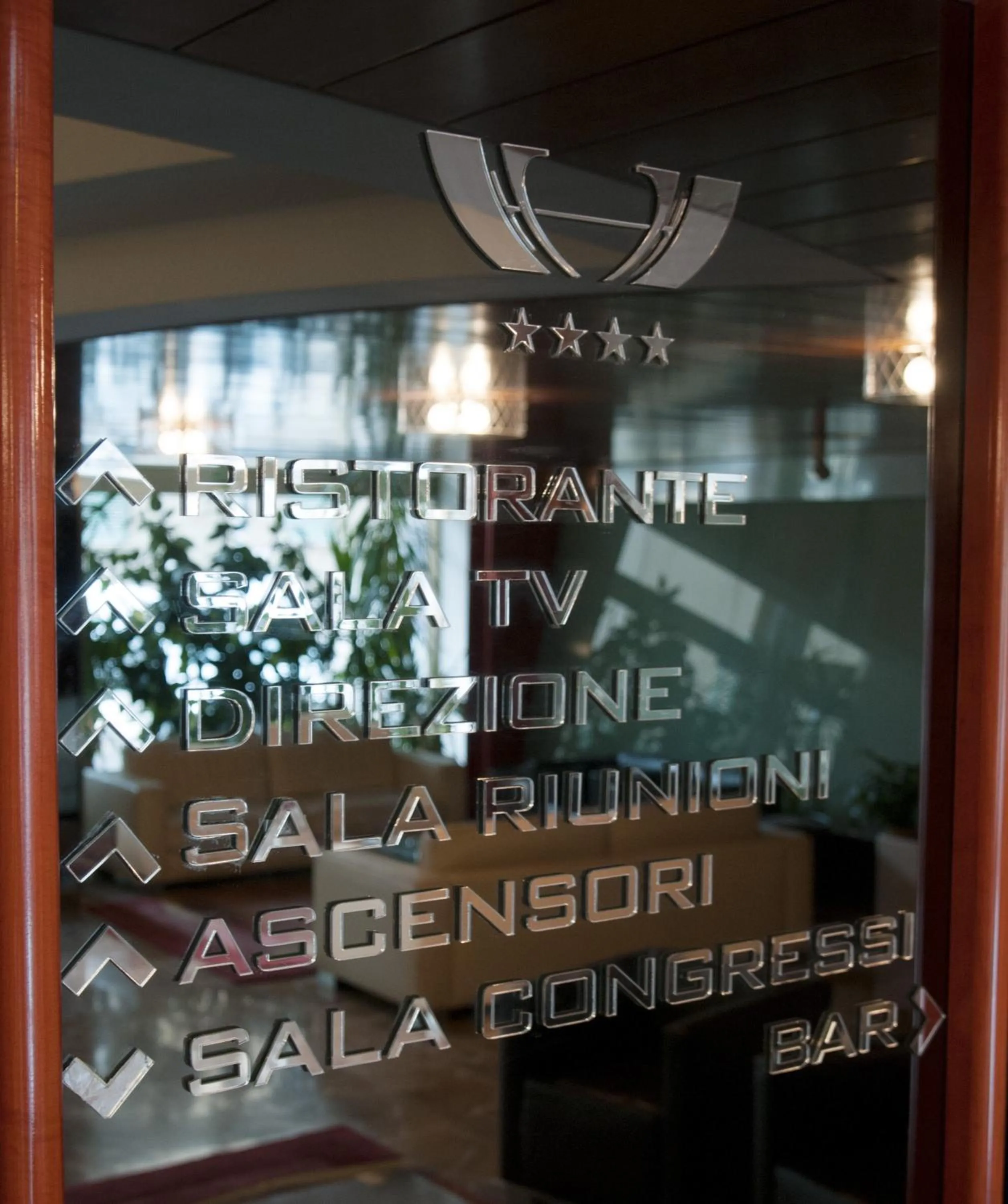 Property logo or sign in Hotel Valentino