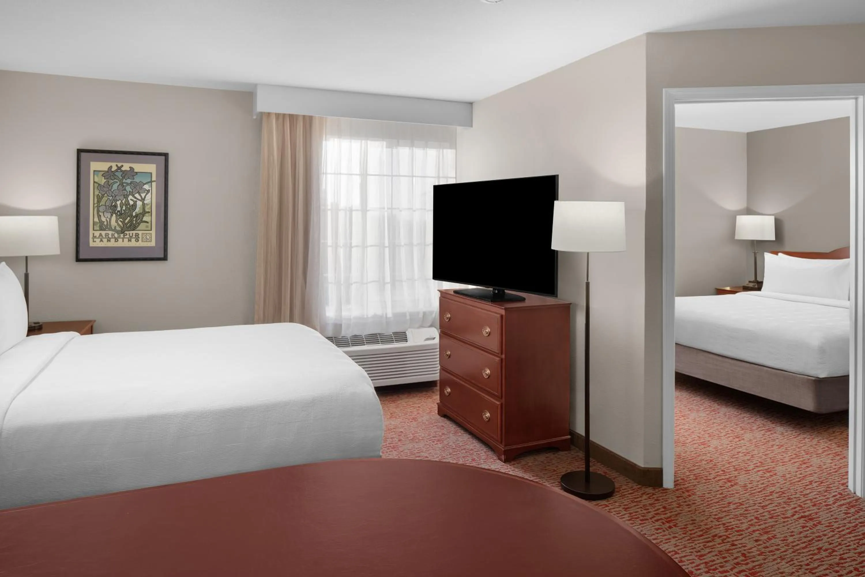 Bed in Larkspur Landing Extended Stay Suites Sacramento