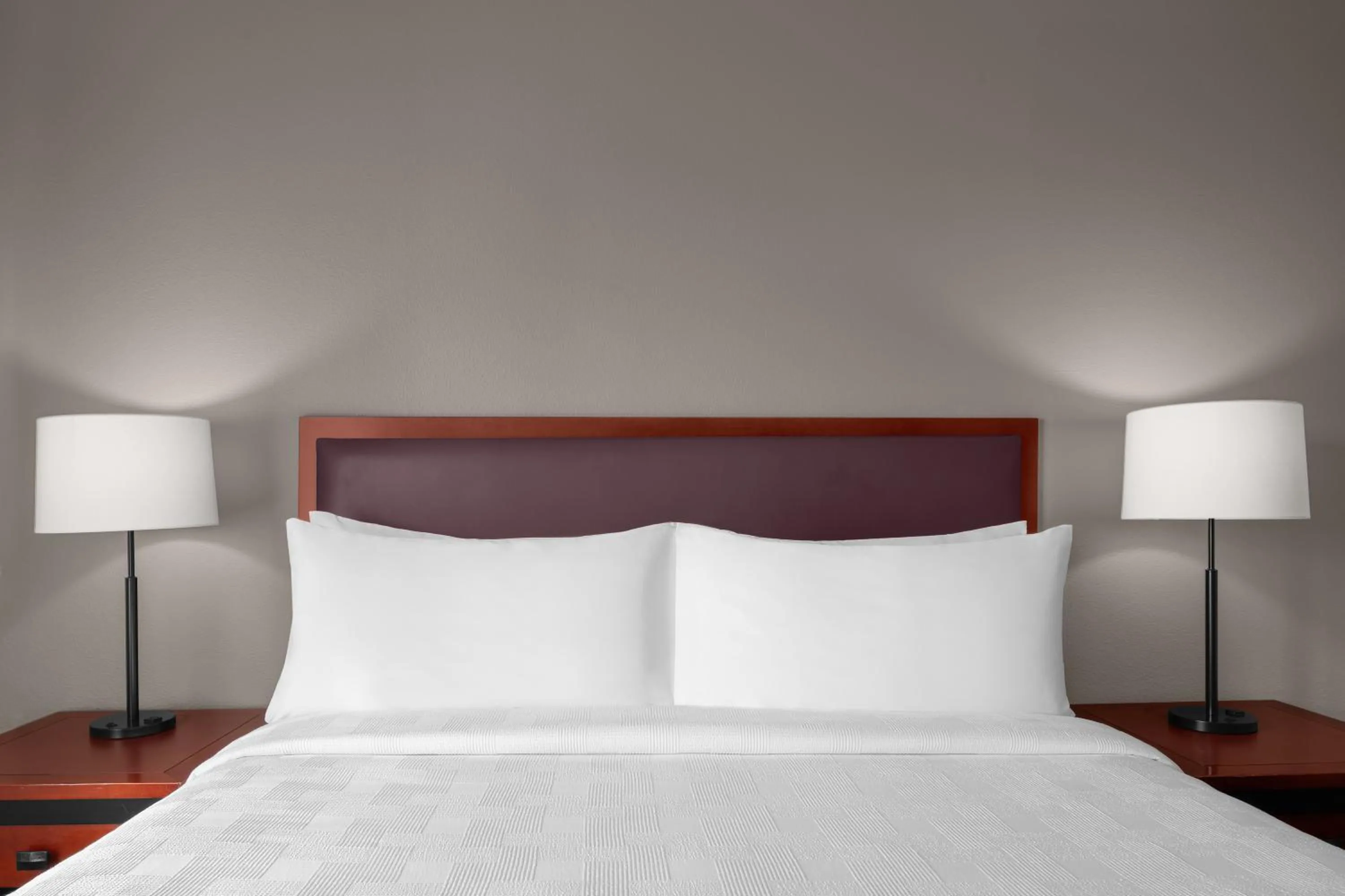 Bed in Larkspur Landing Extended Stay Suites South San Francisco