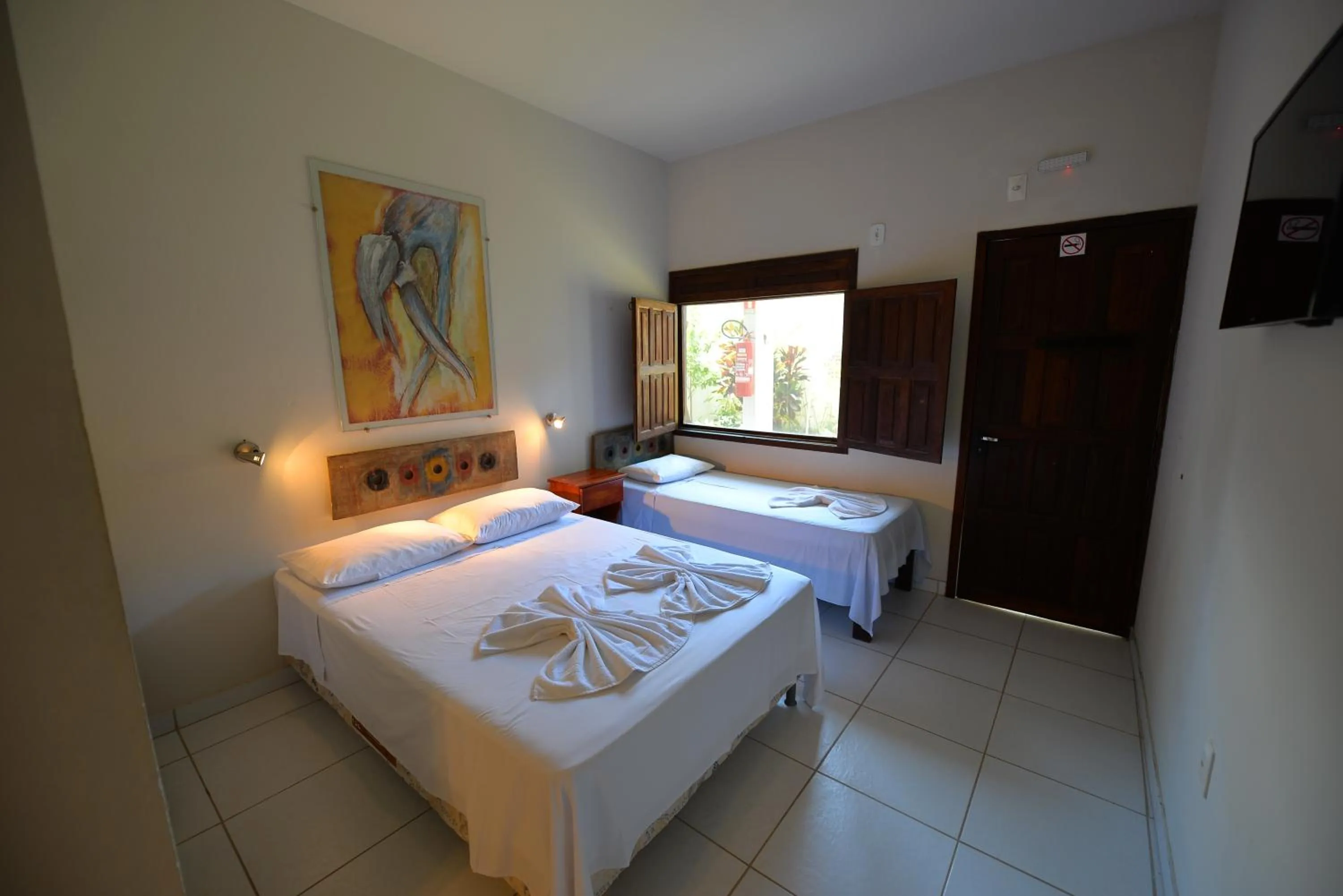 Bed in Pousada do Gunga