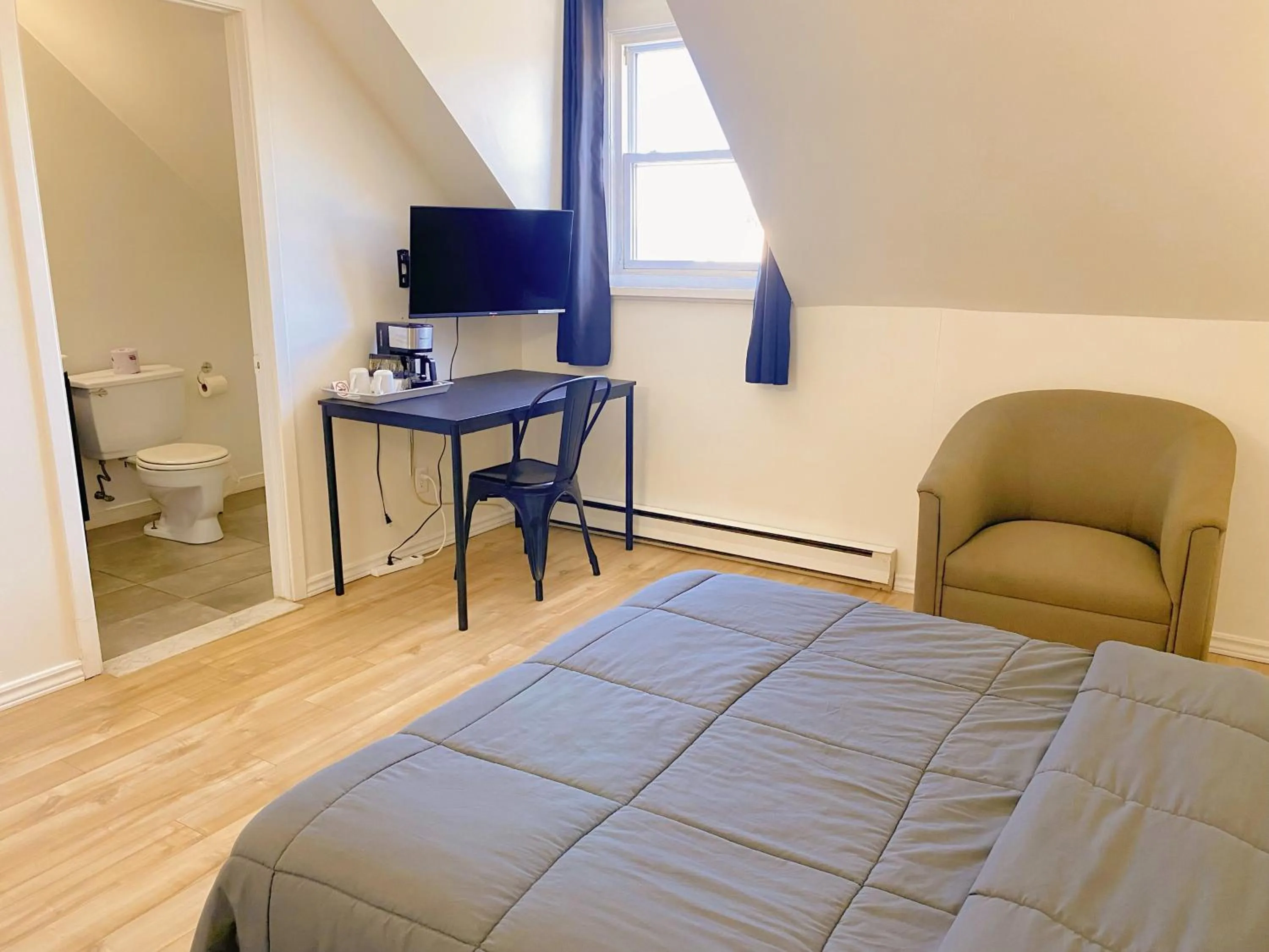 Bed in Motel Grande Ile