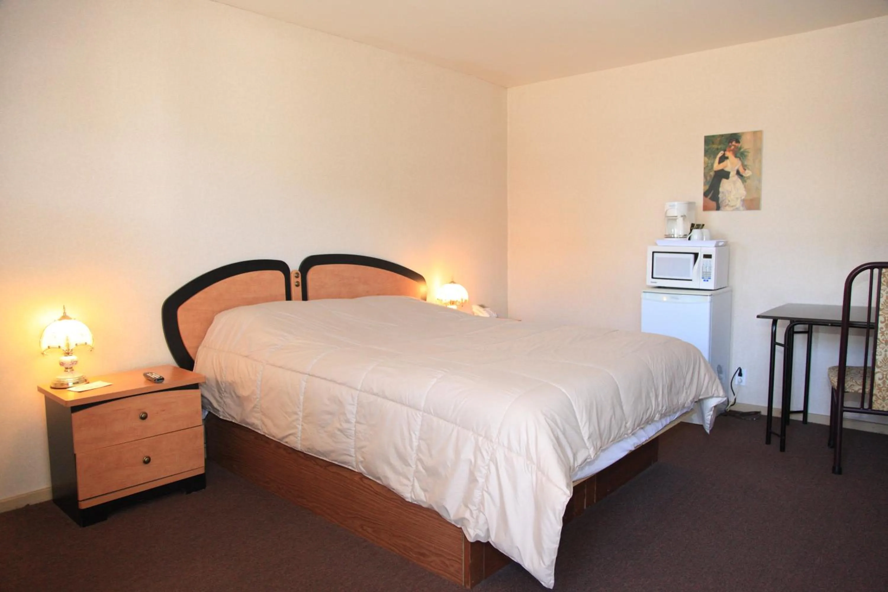 Bed in Motel Grande Ile