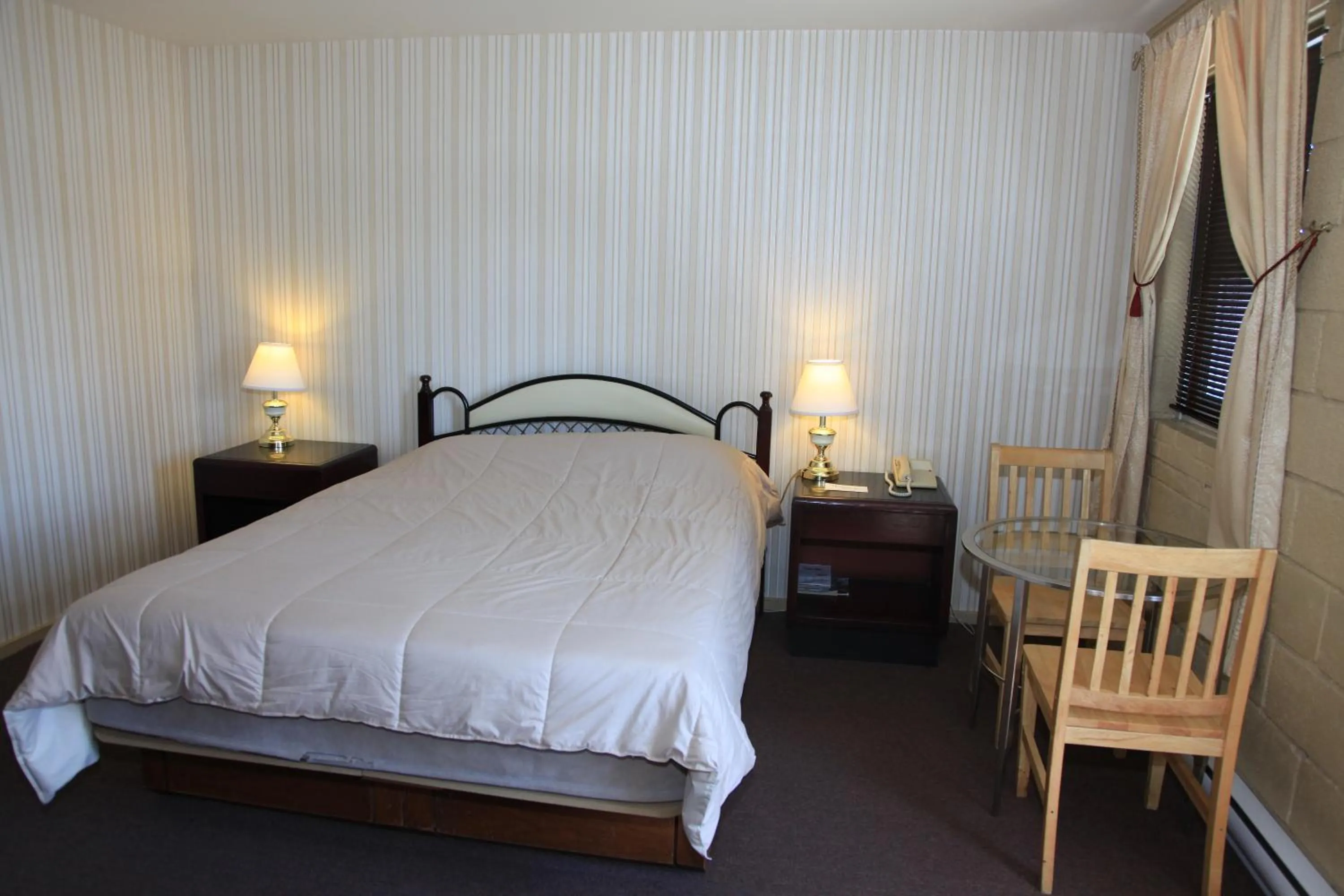 Bed in Motel Grande Ile