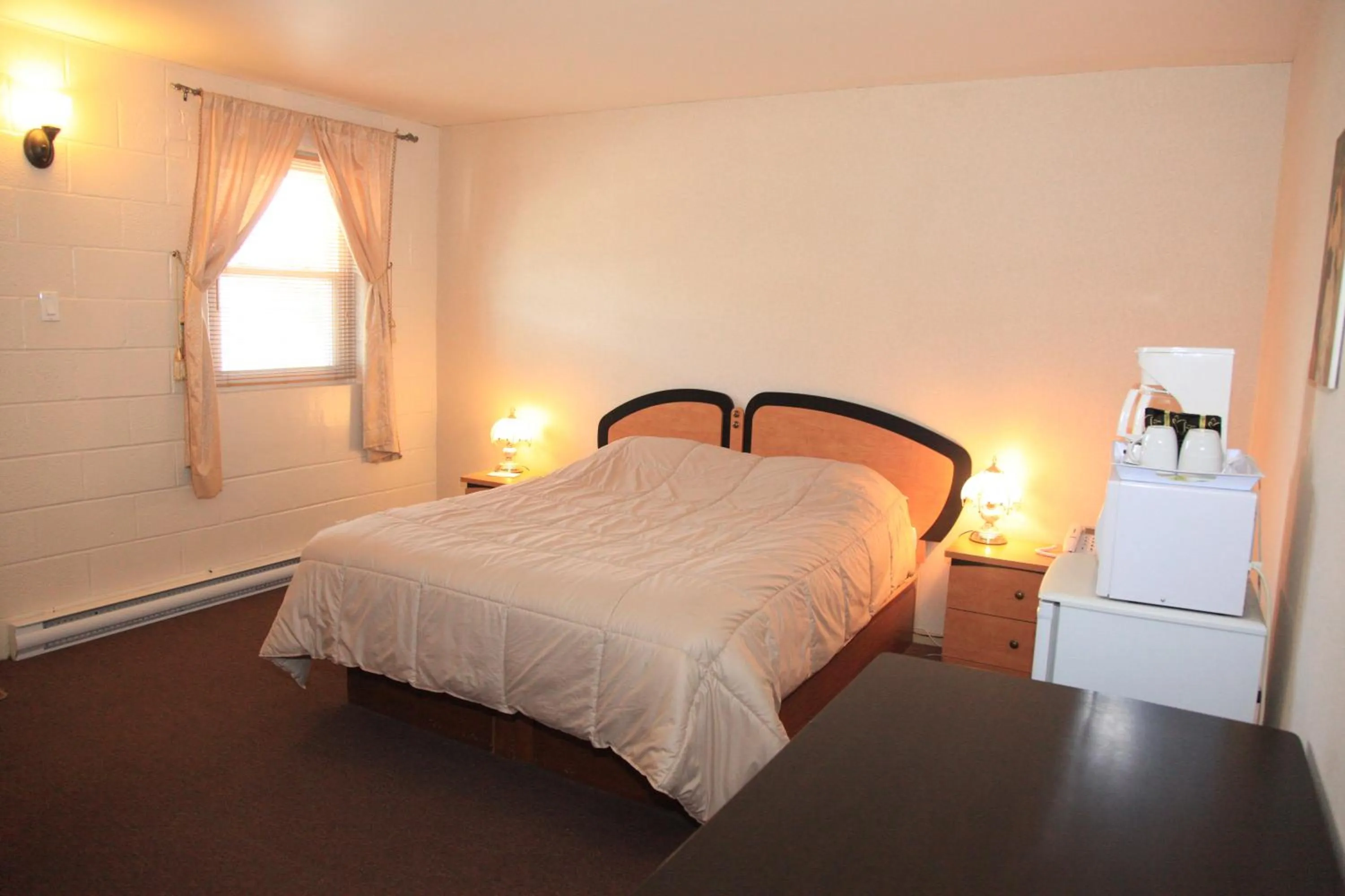 Bed in Motel Grande Ile