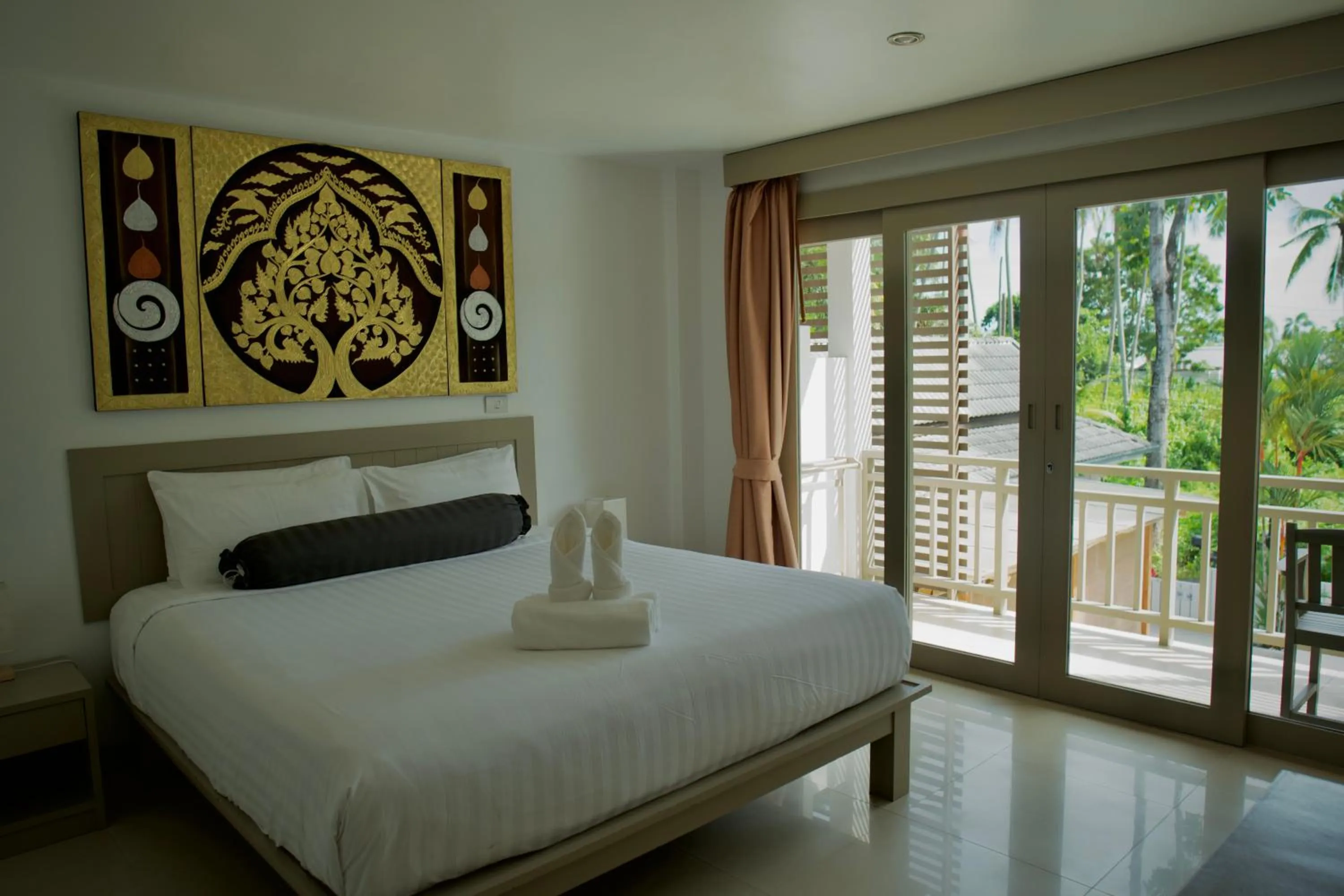 Bed in Ampha Place Hotel