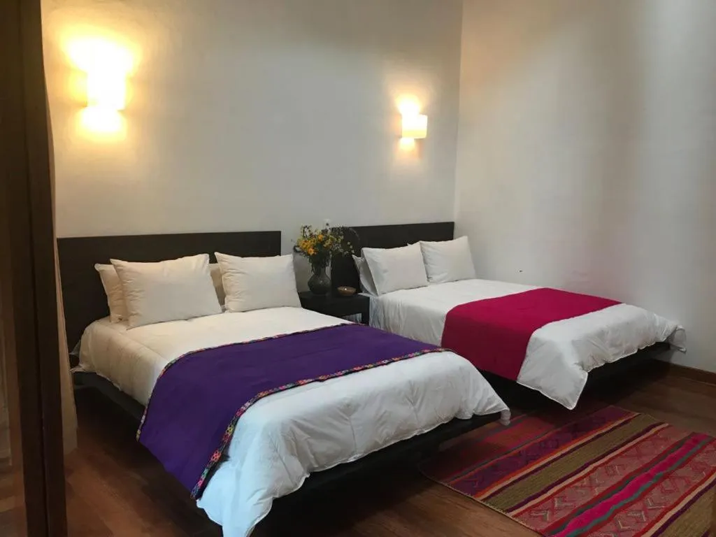 Decorative detail, Bed in Bamboo Lodge Sacred Valley