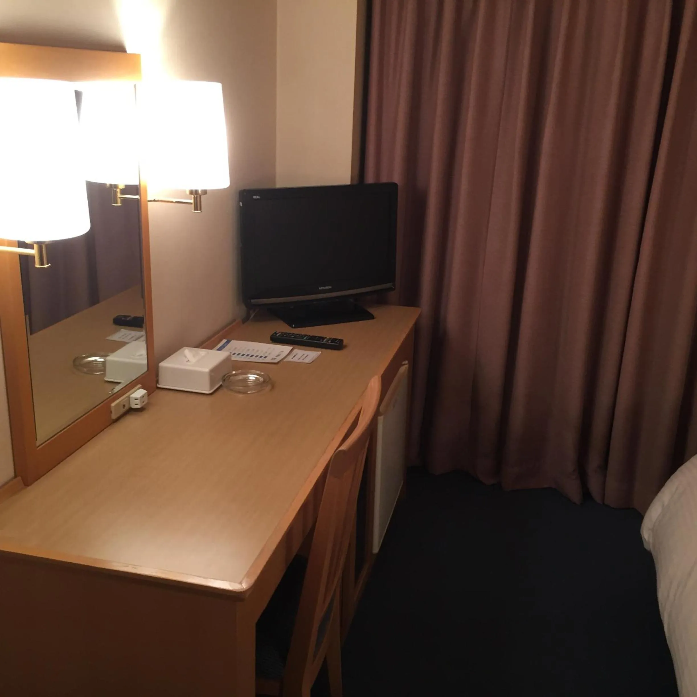 Communal lounge/ TV room in Hotel Crown Hills Kofu