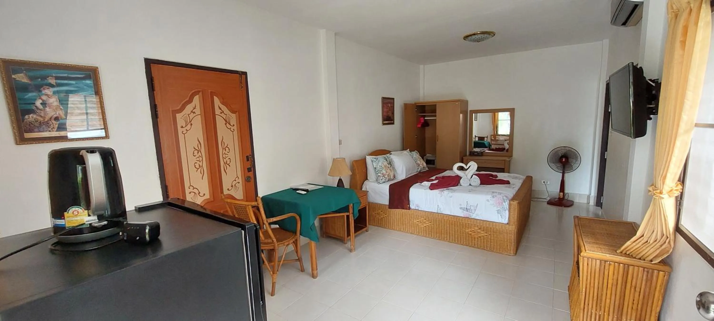 Bed in Jungle Village Bungalow