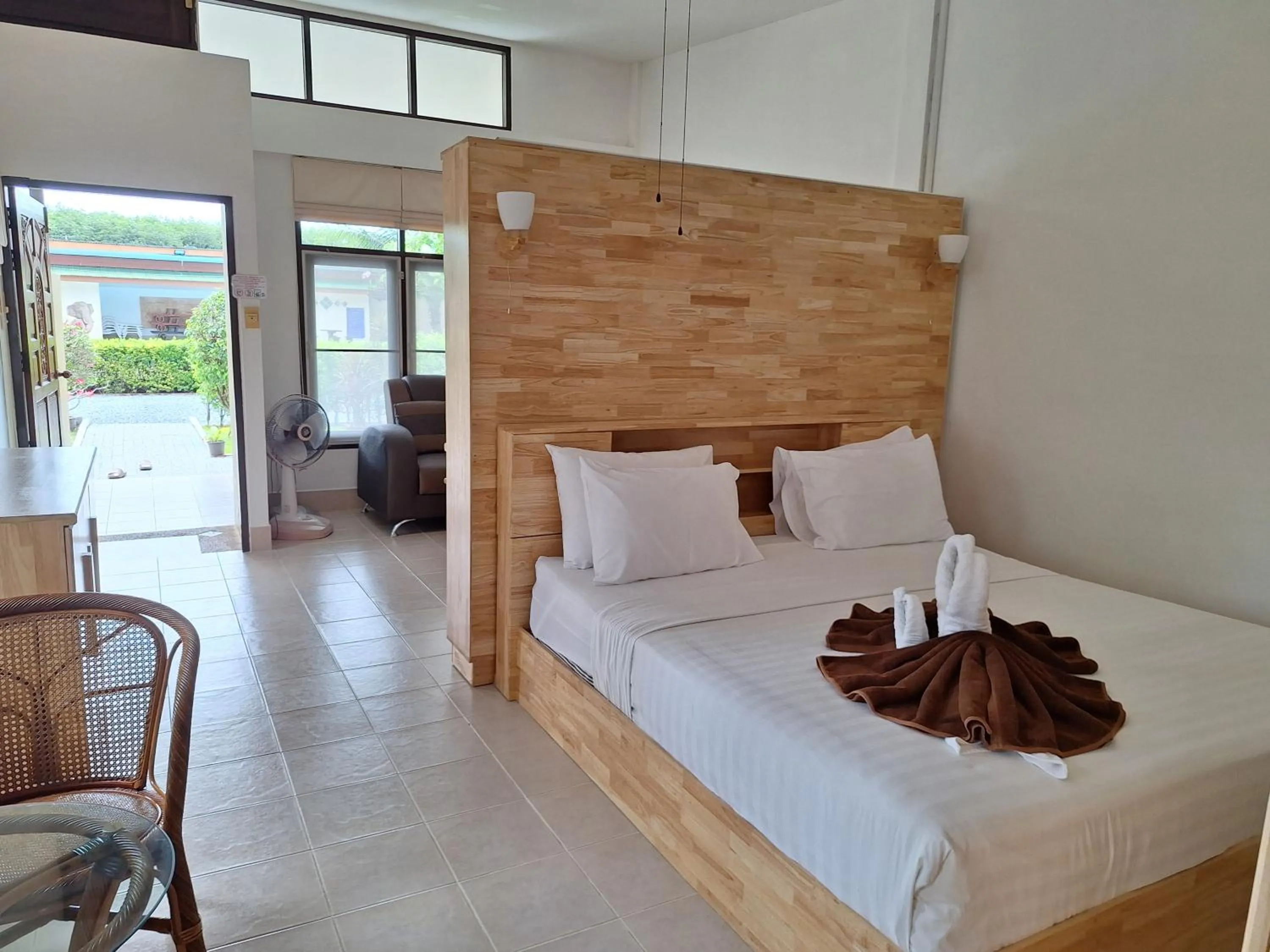 Bed in Jungle Village Bungalow