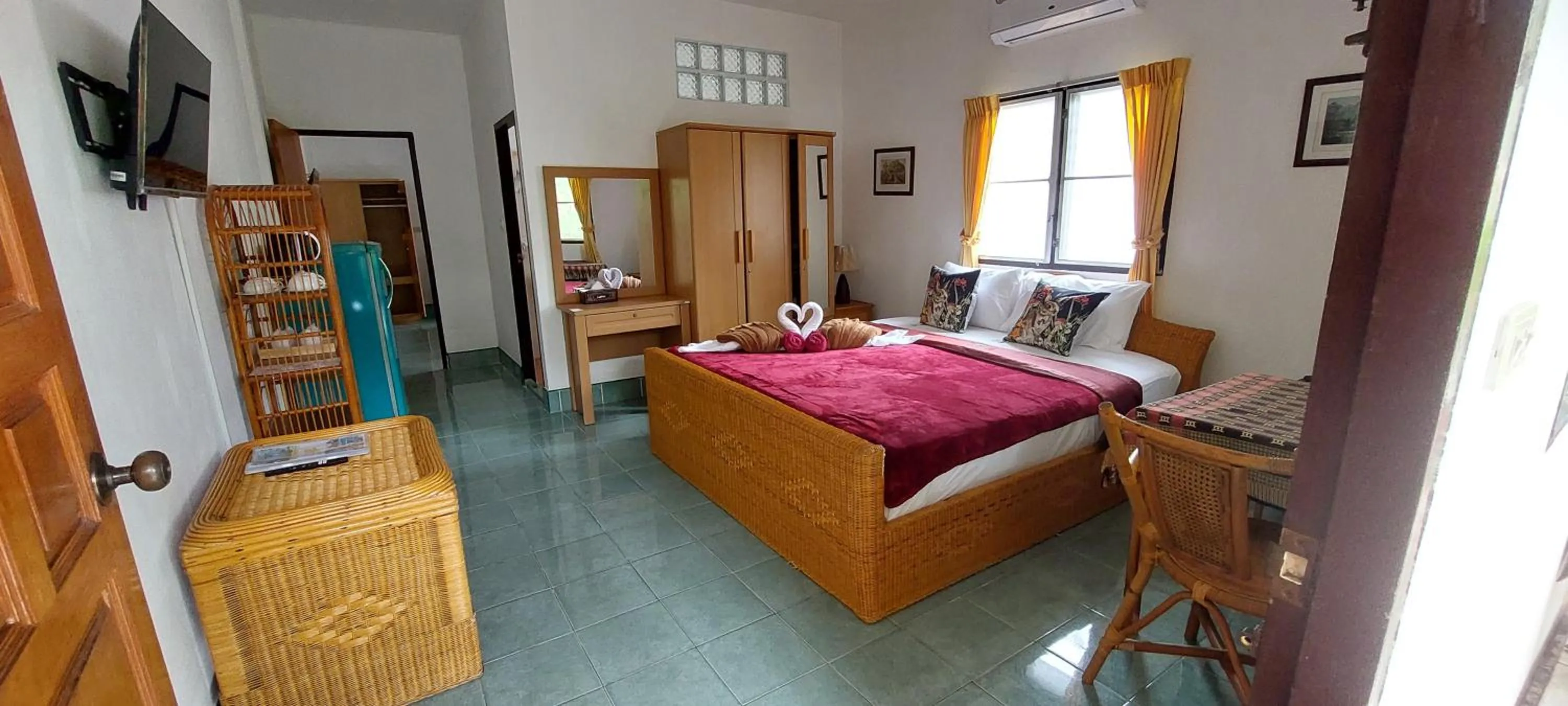 Bed in Jungle Village Bungalow