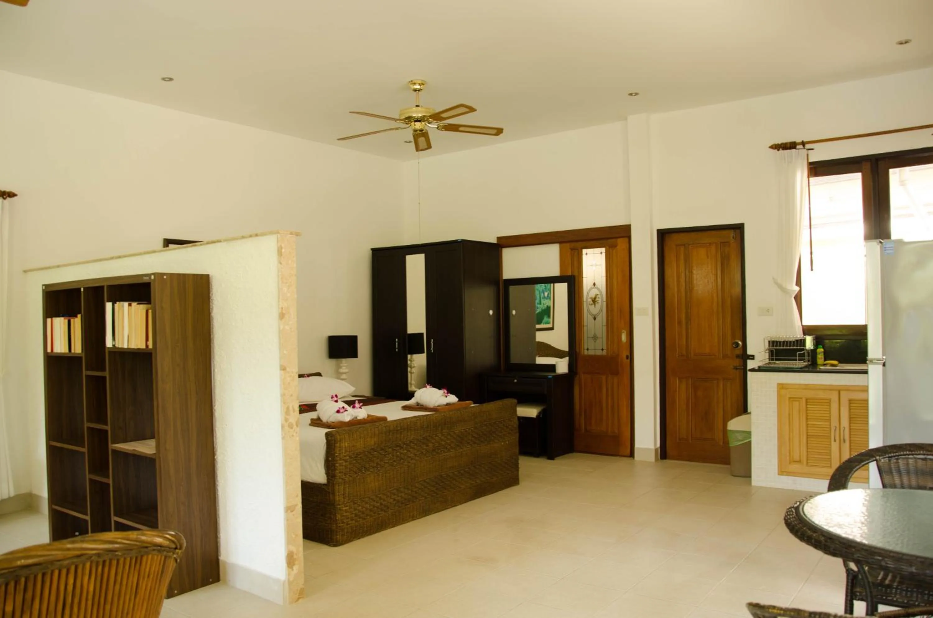 Bed in Jungle Village Bungalow