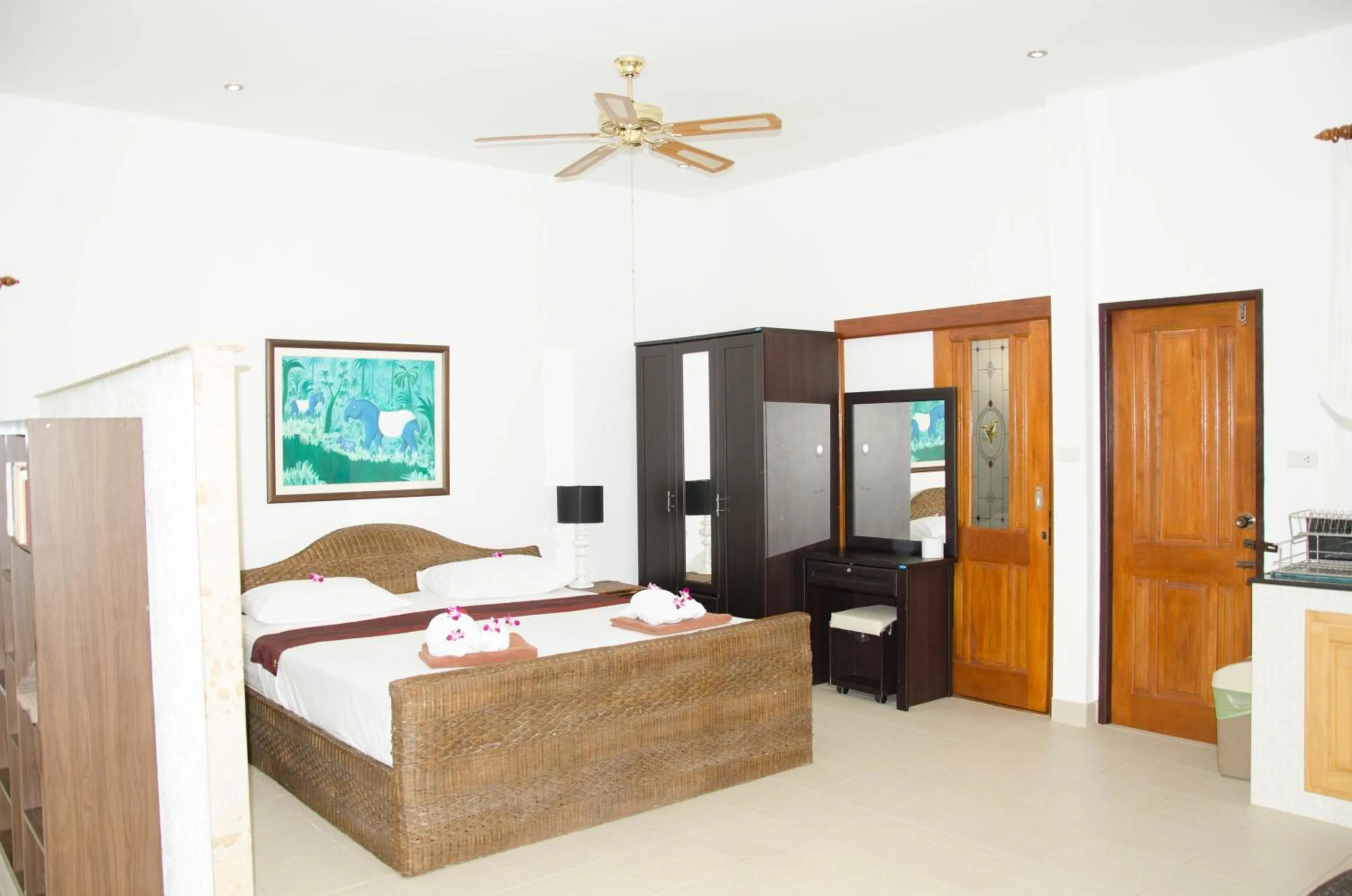 Bed in Jungle Village Bungalow