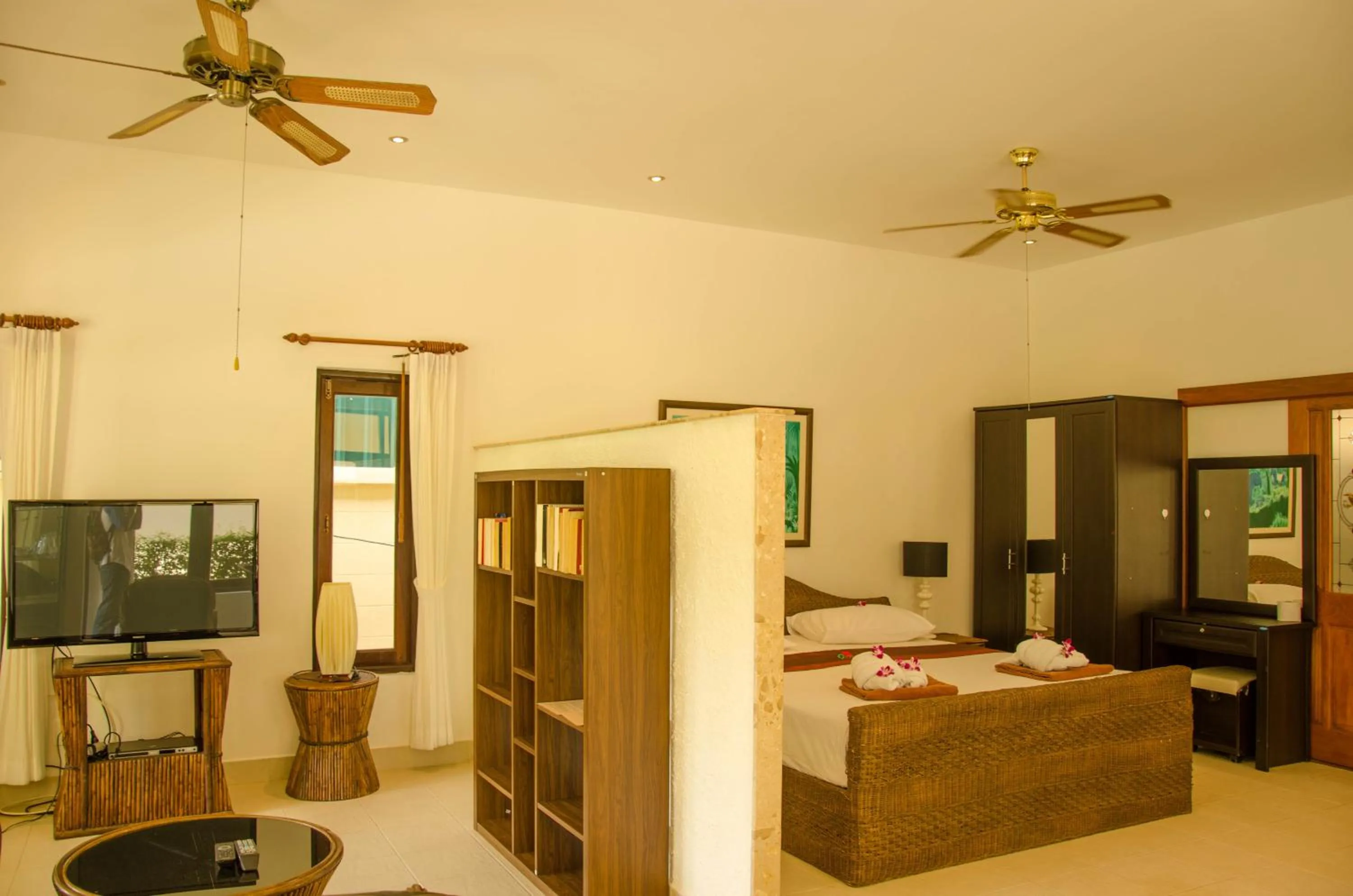 Bed in Jungle Village Bungalow