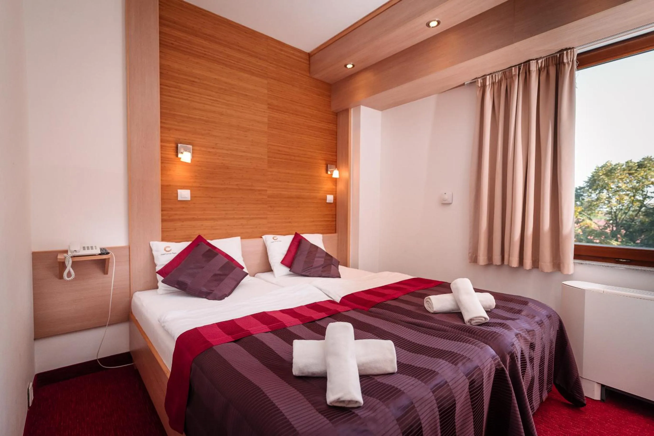 Bed in Hotel Corvus Aqua