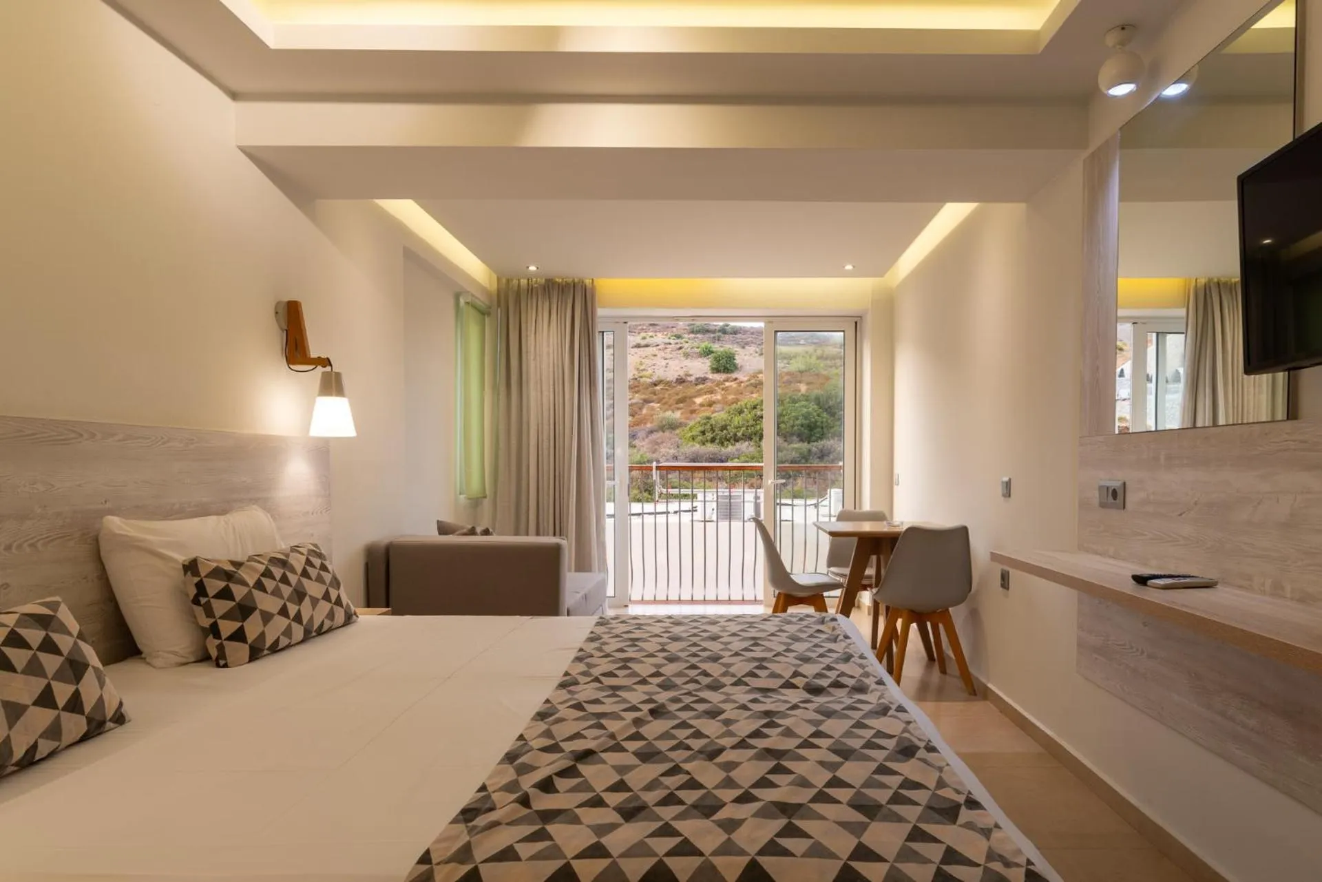 TV and multimedia, Bed in Elpis Studio Apartments