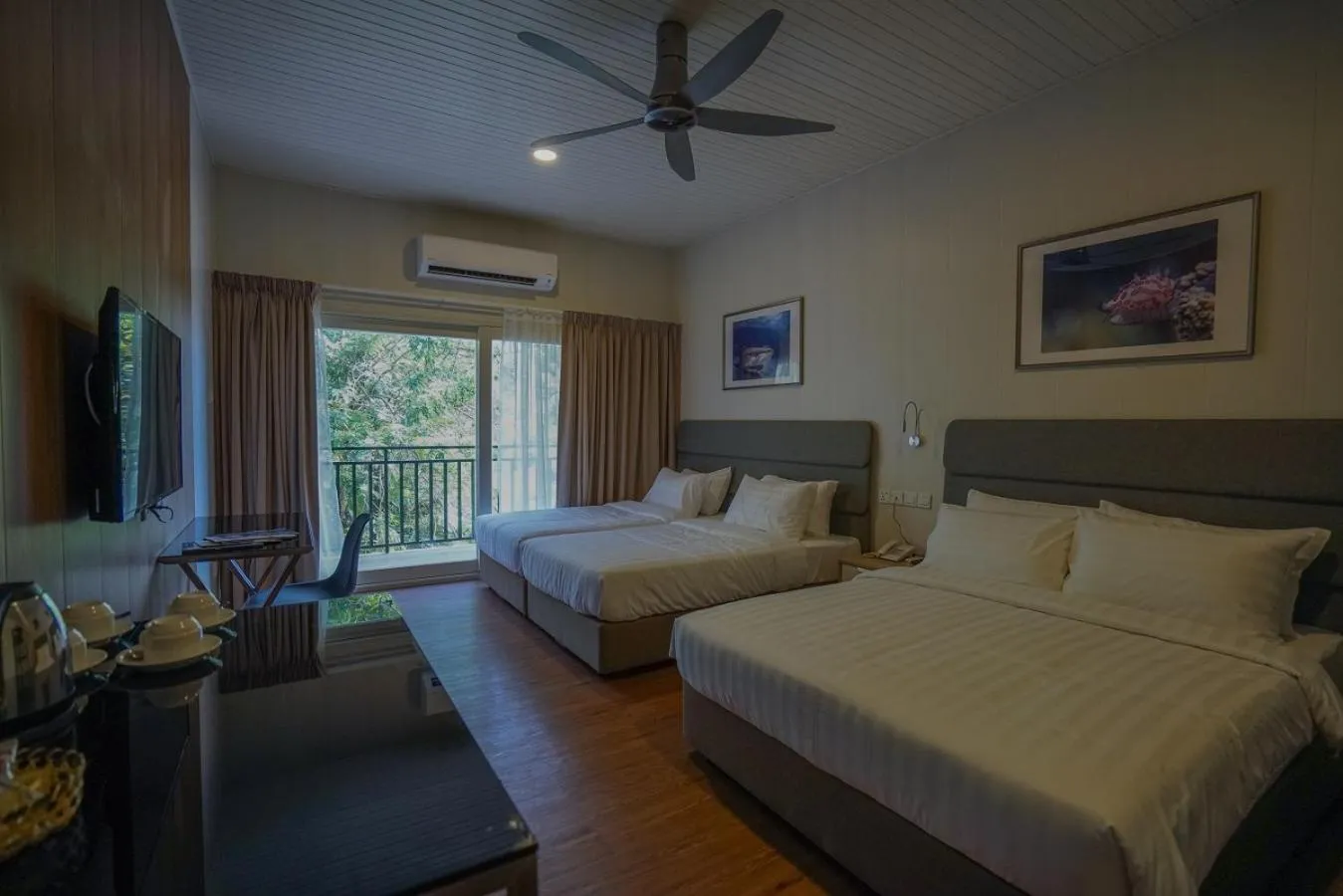 Bed in Aman Tioman Beach Resort