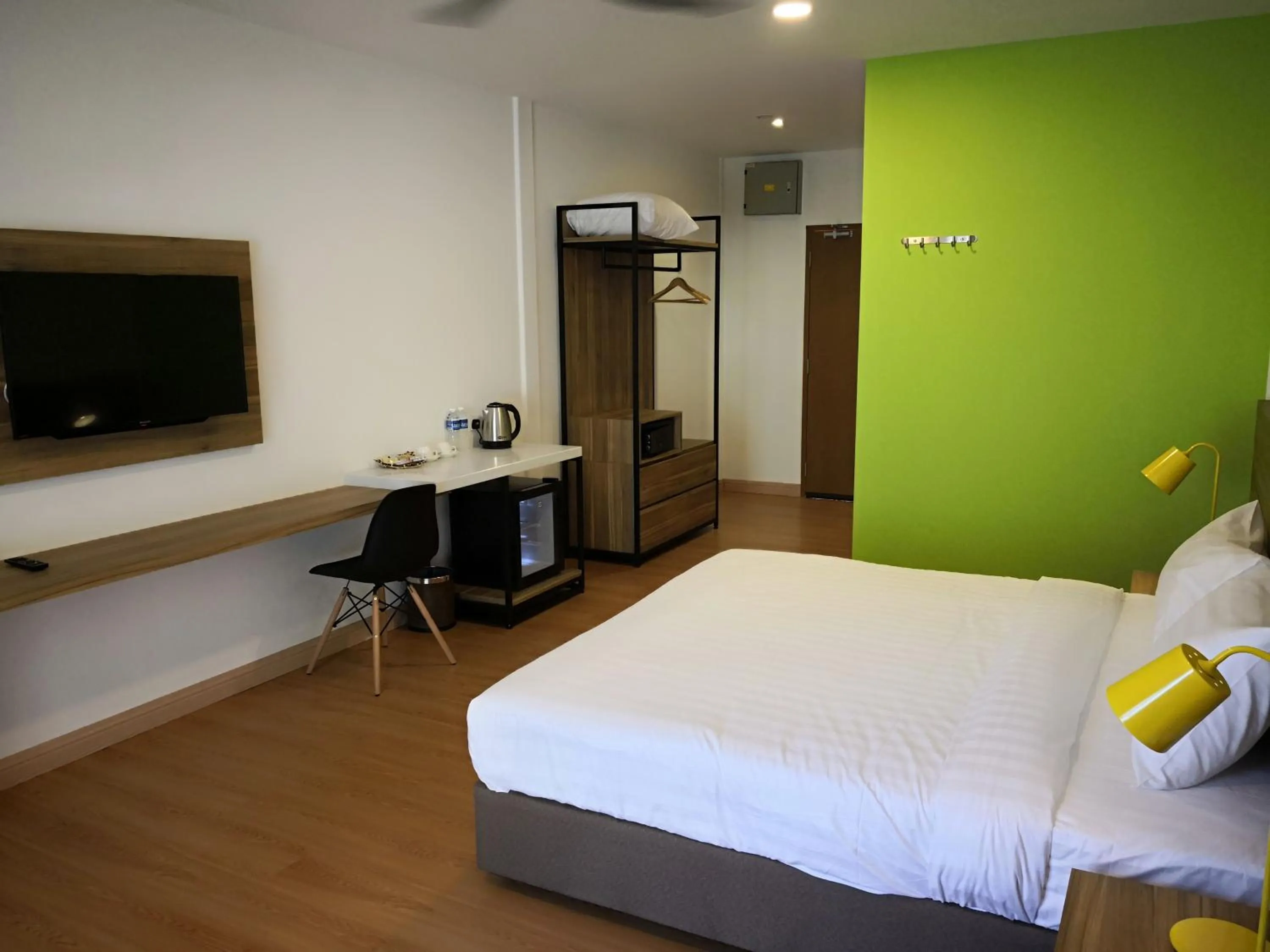 Bed in Aman Tioman Beach Resort