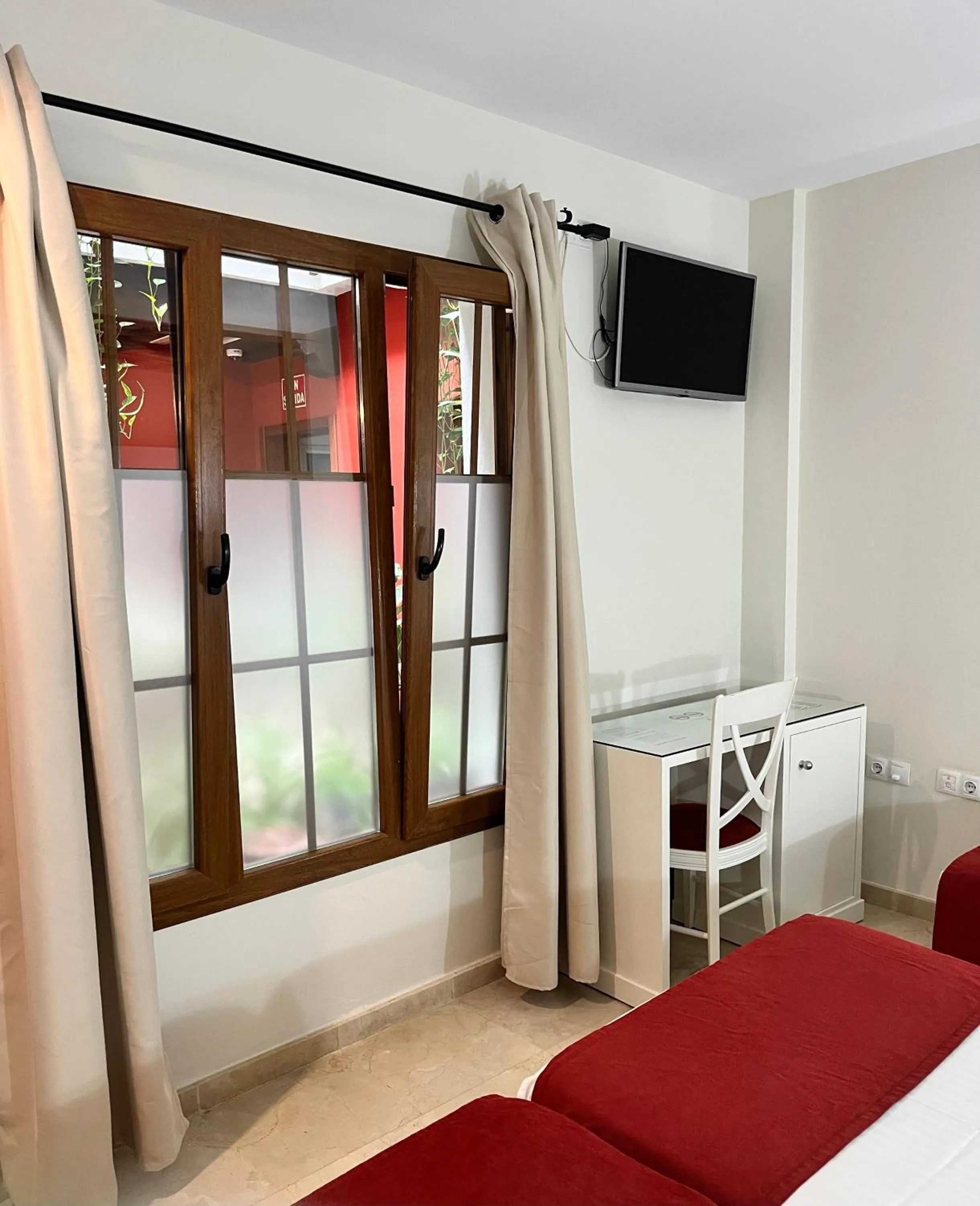 Photo of the whole room, Bed in Hostal Al-Andalus