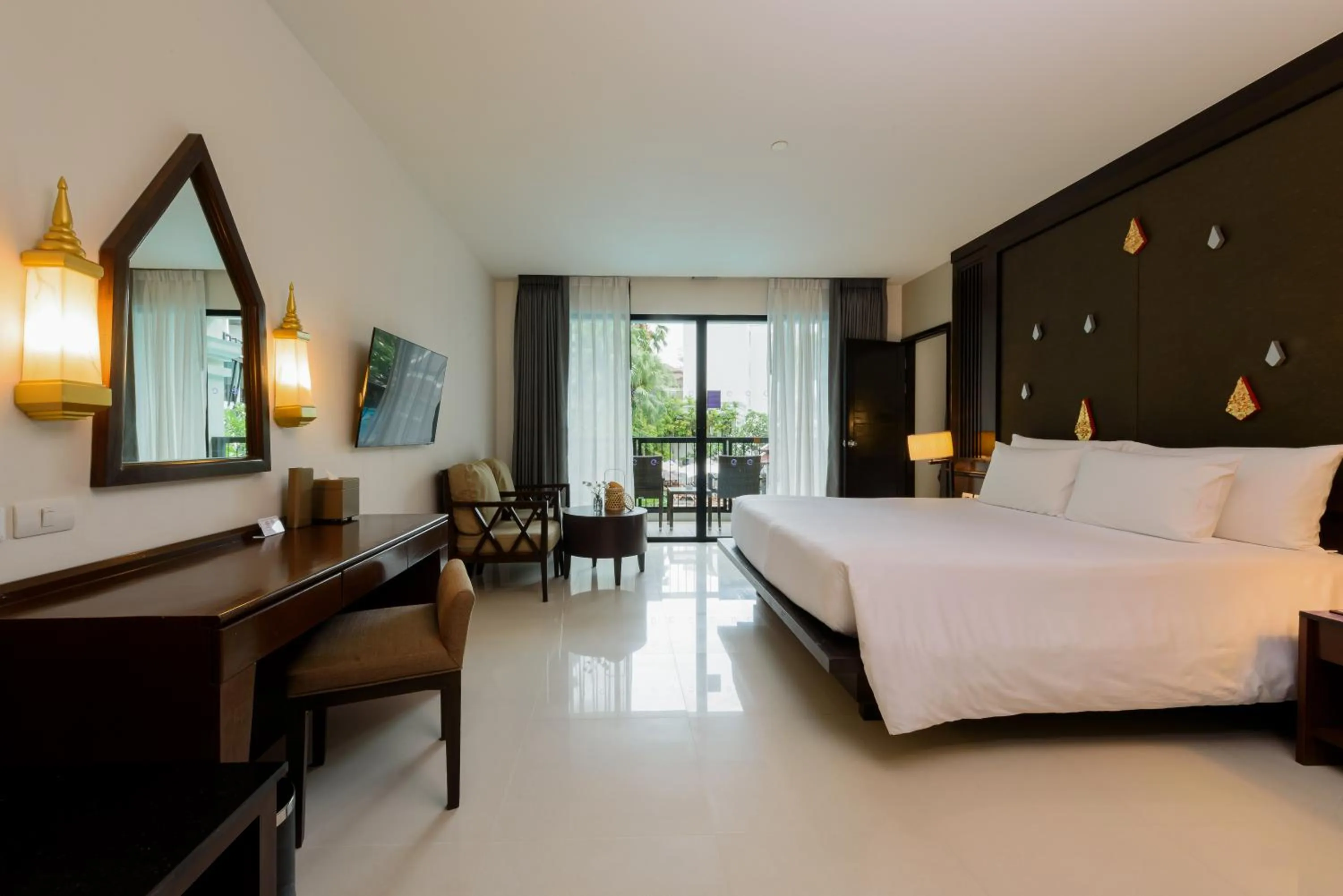 Bed in Centara Anda Dhevi Resort & Spa Krabi