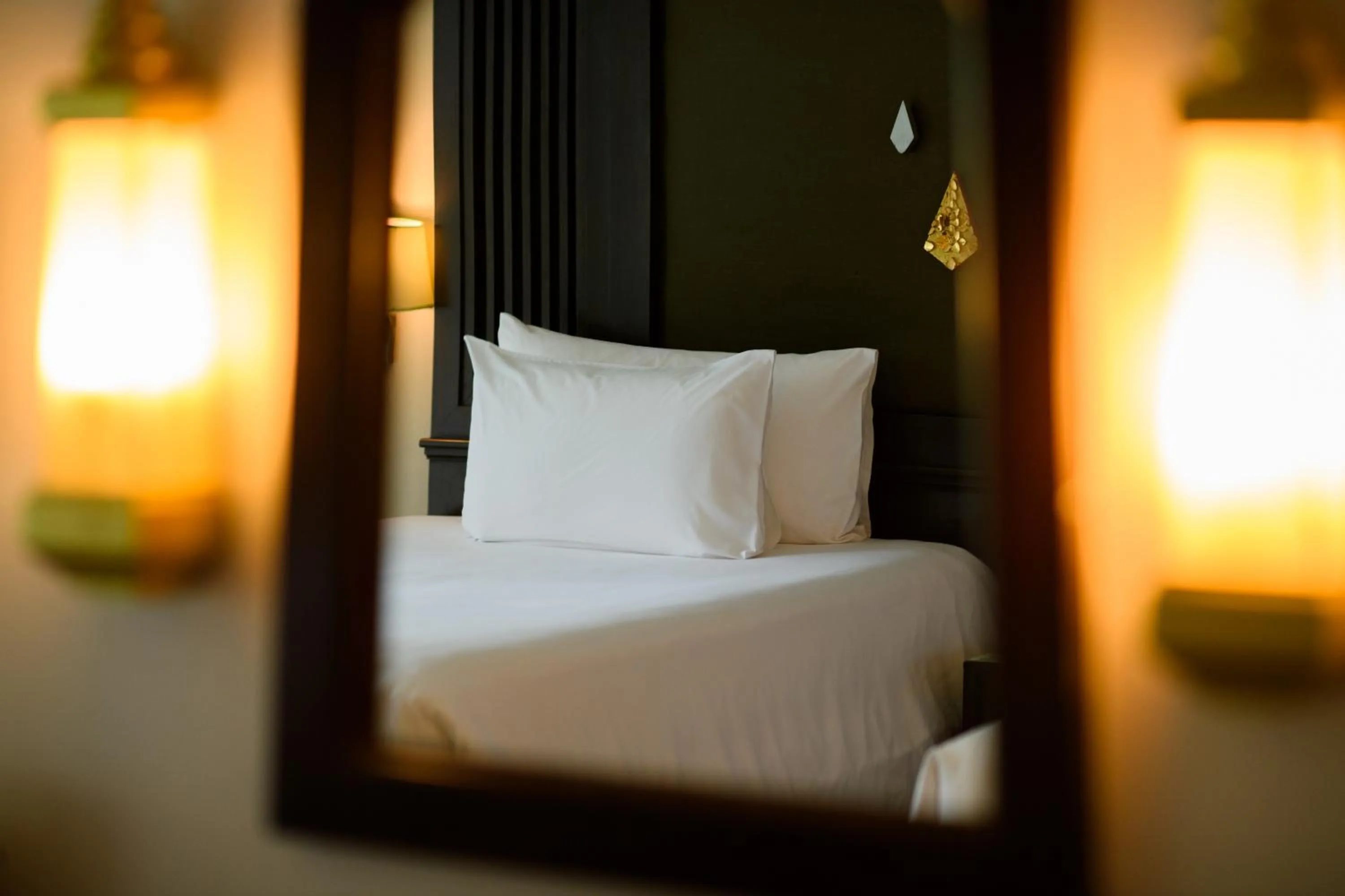 Bed in Centara Anda Dhevi Resort & Spa Krabi