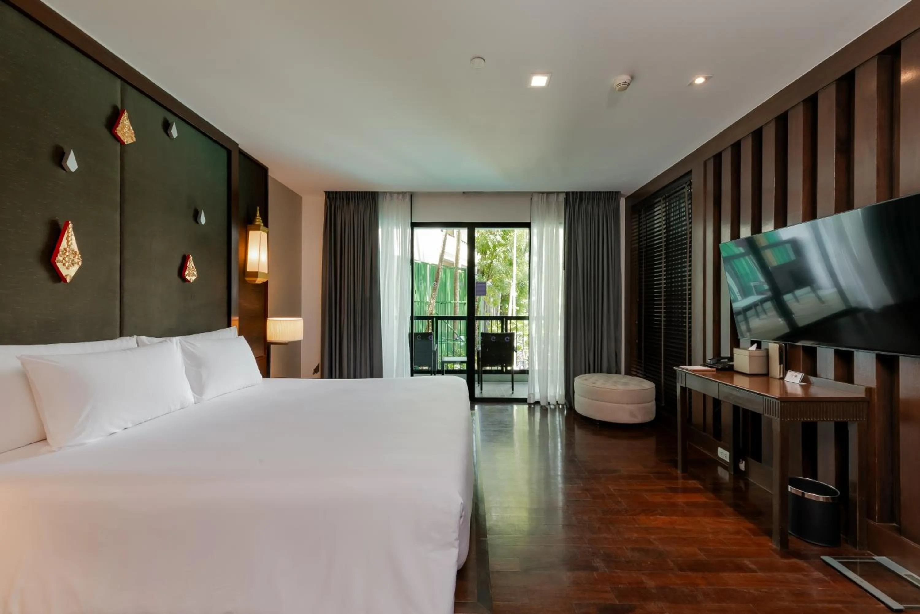 Bed in Centara Anda Dhevi Resort & Spa Krabi